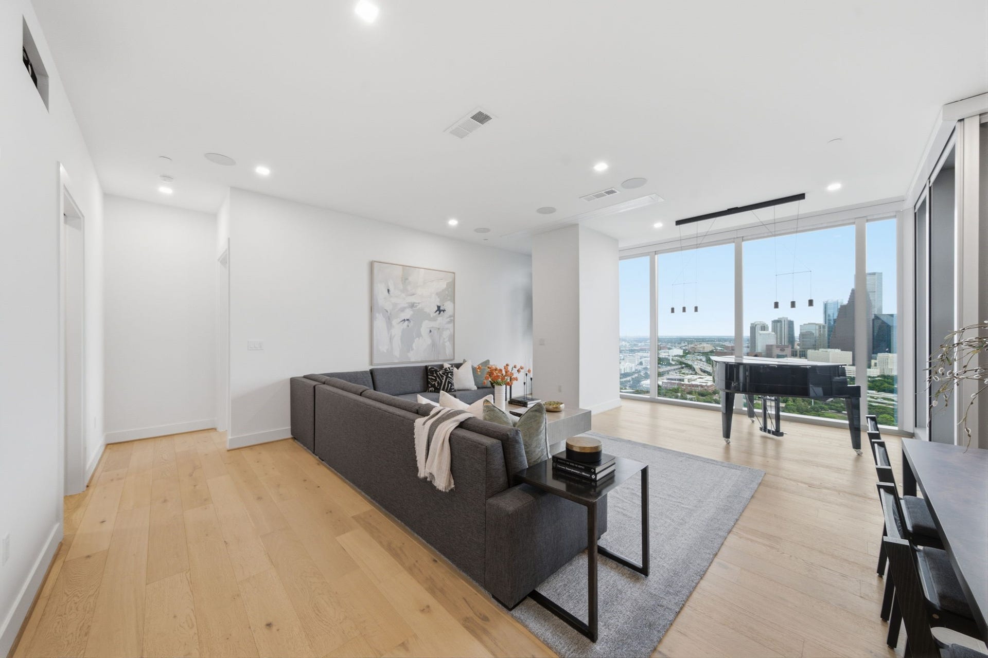 A motorized drop down projector transforms the living area into a private luxury theater perfect for movie nights and entertaining.