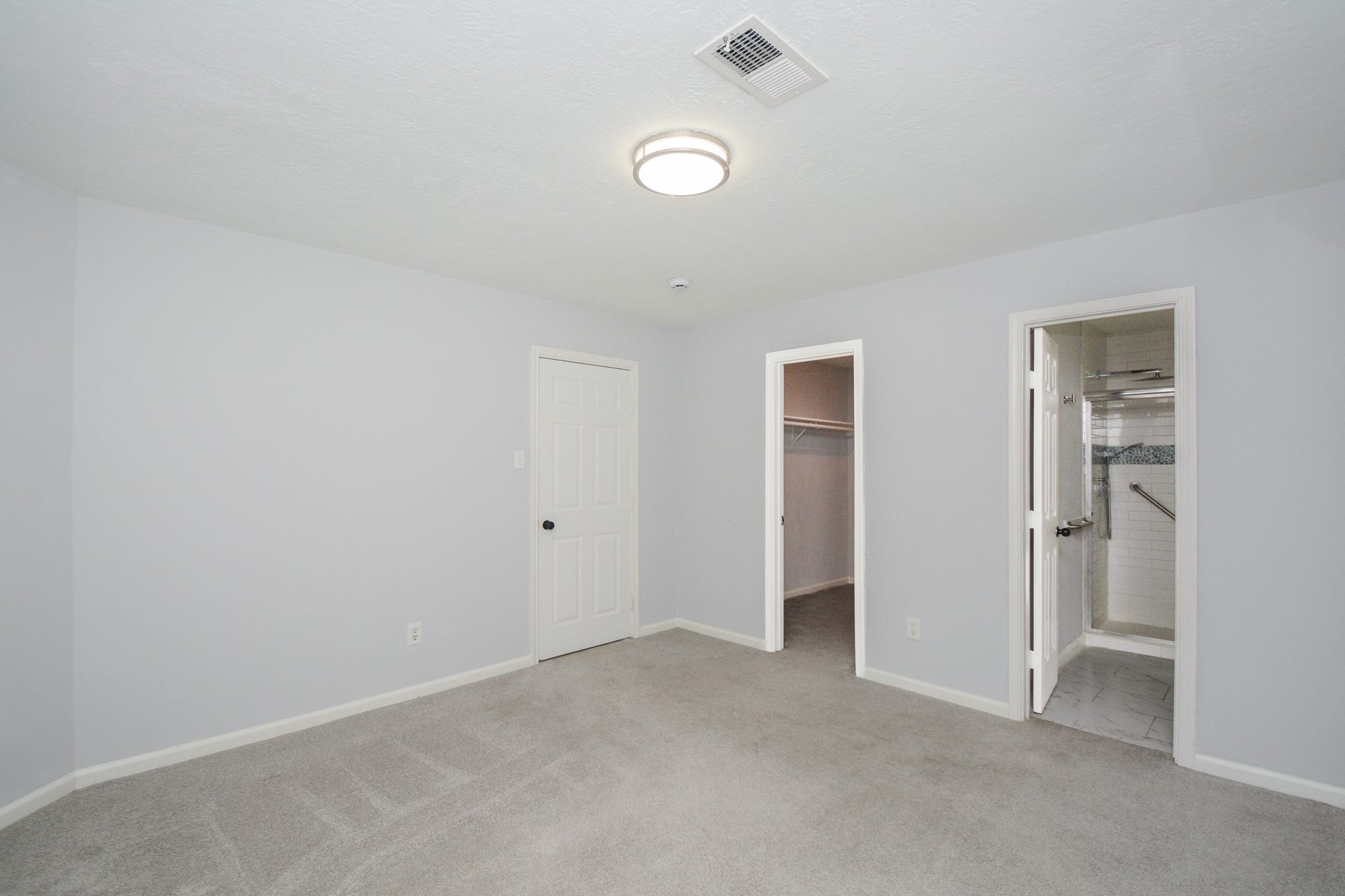 116 Oakmont Drive, Conroe, TX 77301 View of the primary bedroom.