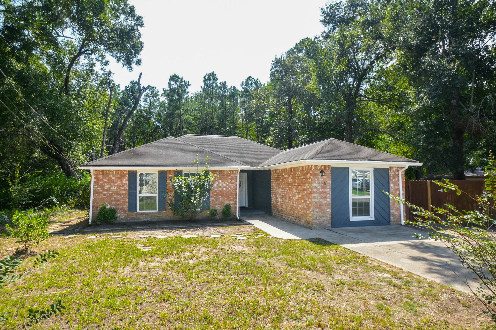 116 Oakmont Drive, Conroe, TX 77301 Front elevation view of the property.