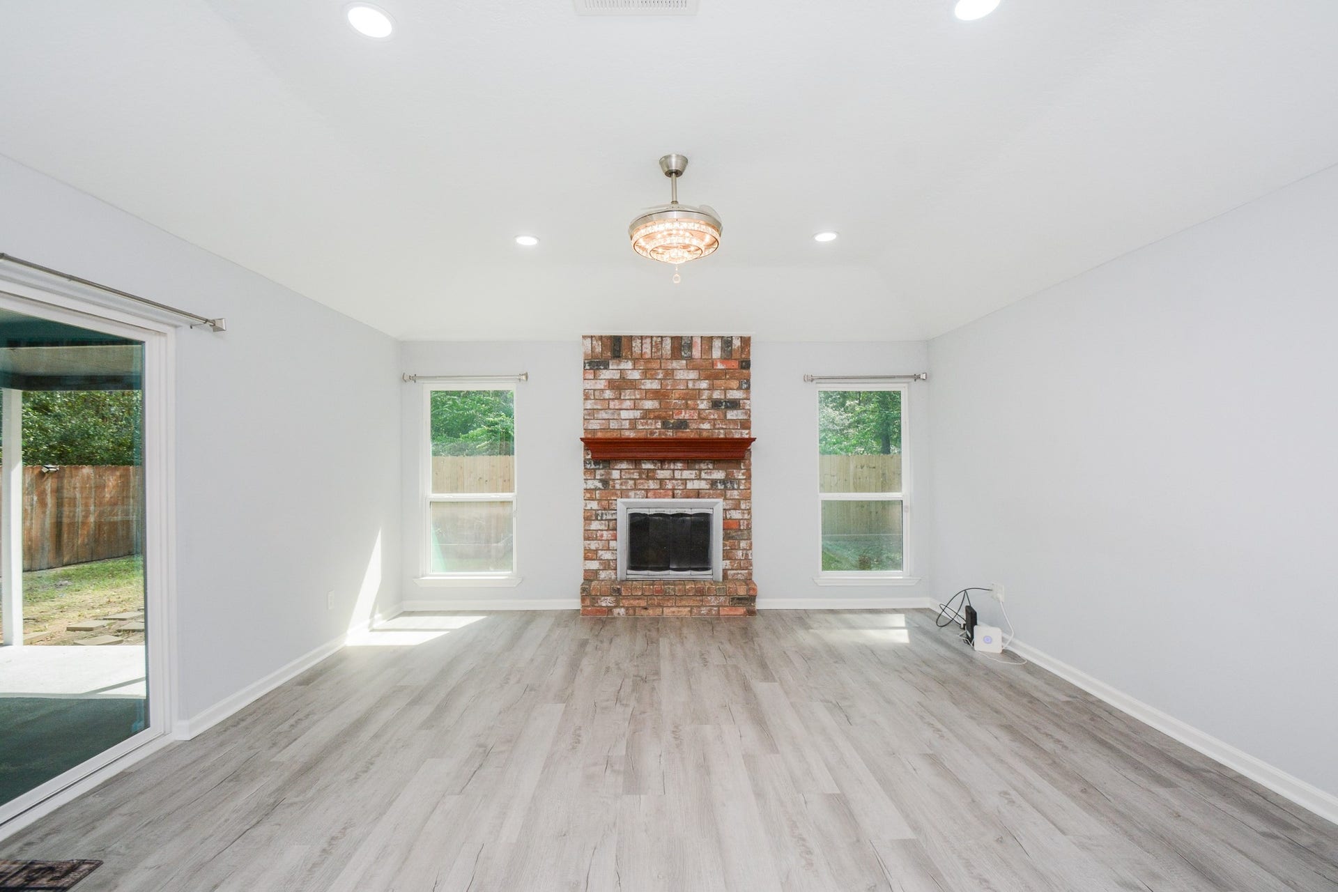 116 Oakmont Drive, Conroe, TX 77301 View from the kitchen overlooking the dining & den area.