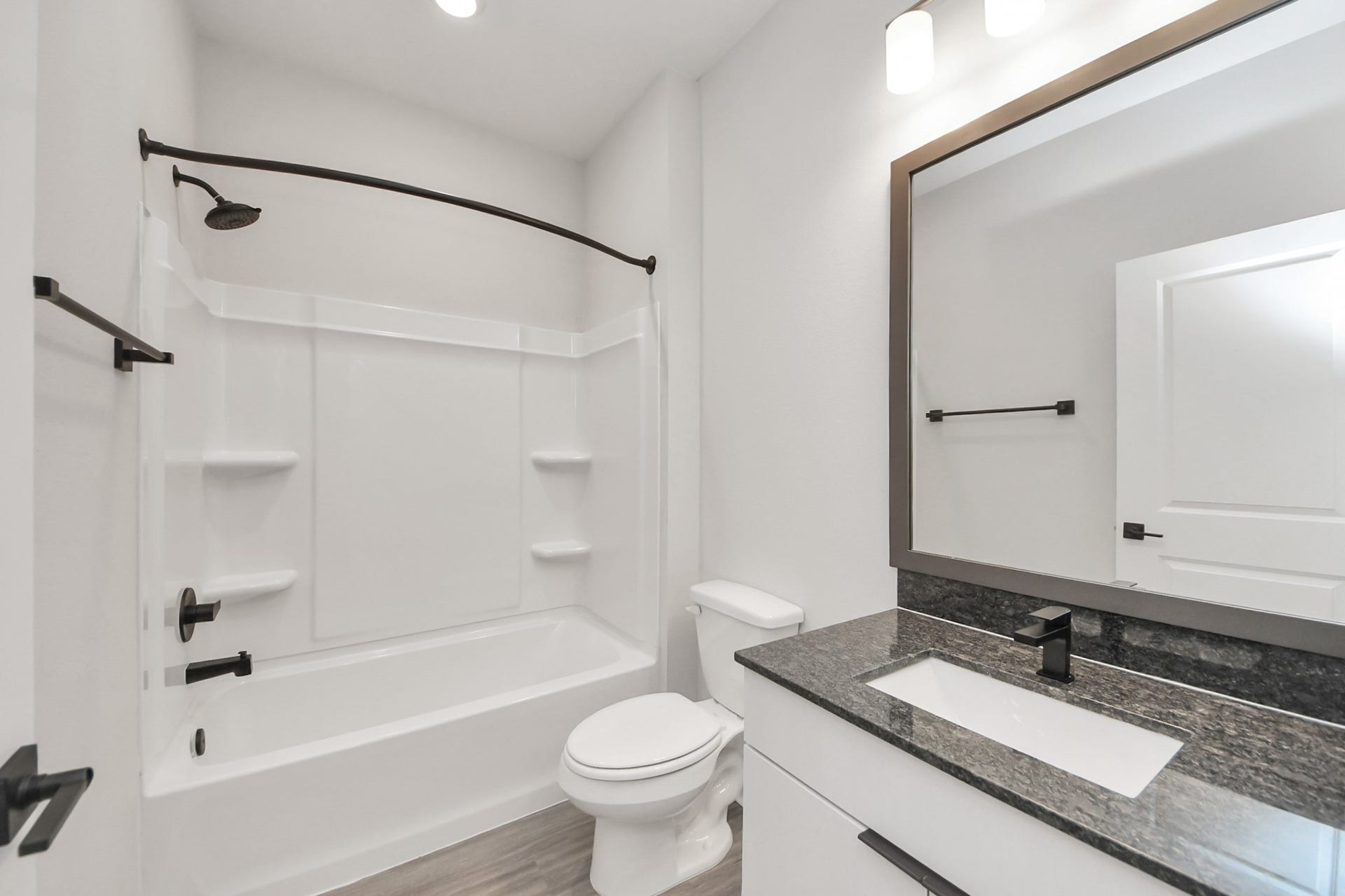 7711 Longmire Road, #199, Conroe, TX 77304 Full Bathroom with granite counters