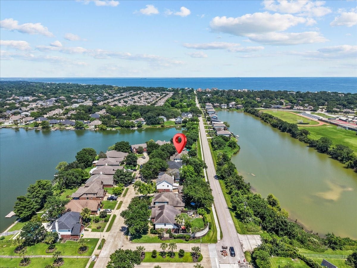 1409 Mija Lane, Seabrook, TX 77586 Convenient lake access nearby for kayaking, fishing, and outdoor recreation.