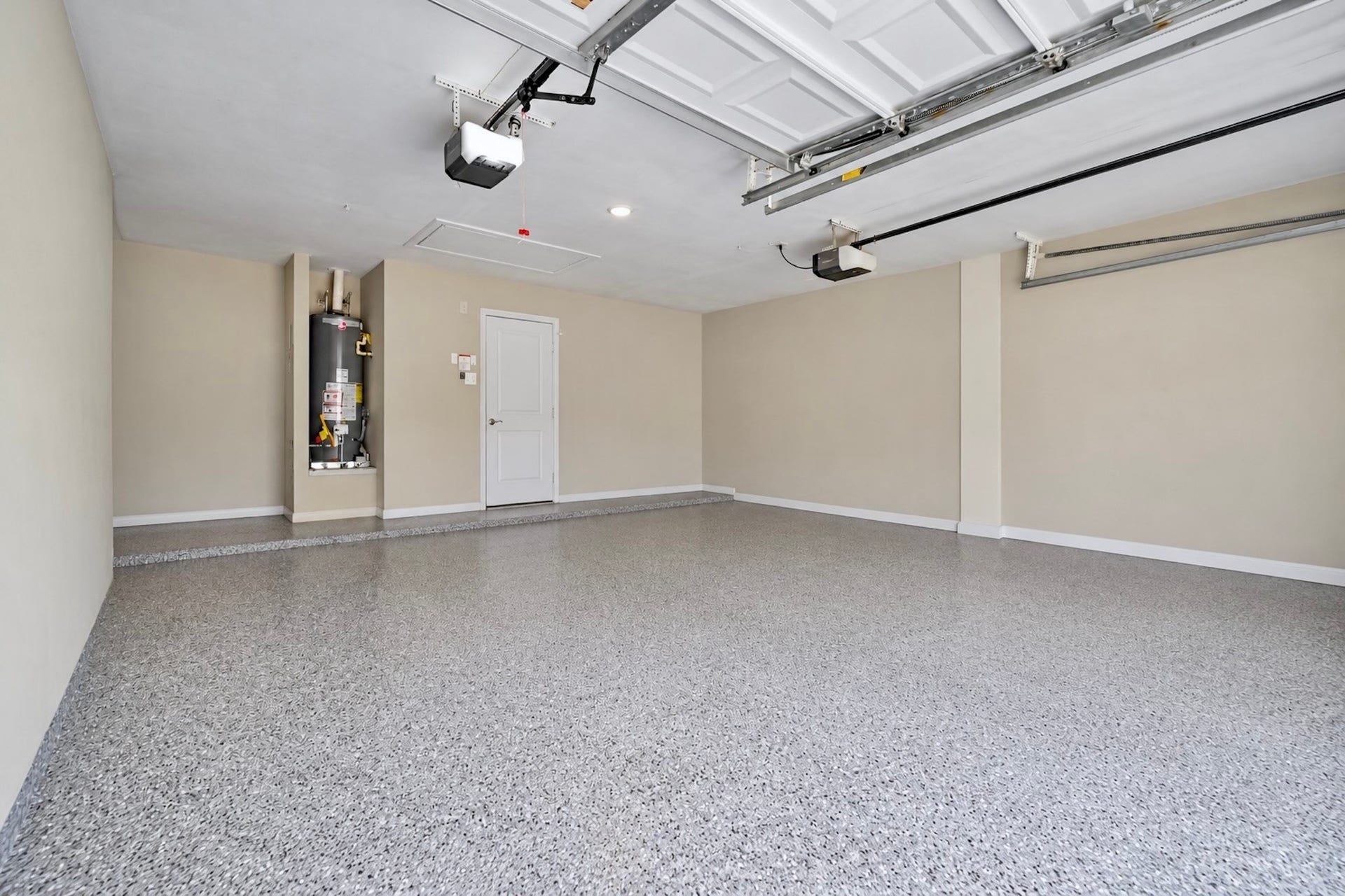 2419 Broken Elm Drive, Richmond, TX 77406 More than a place to park, the attached 2-car garage features an epoxy-finished floor for a cleaner, more durable space for vehicles, storage, hobbies or projects. Virtually decluttered.