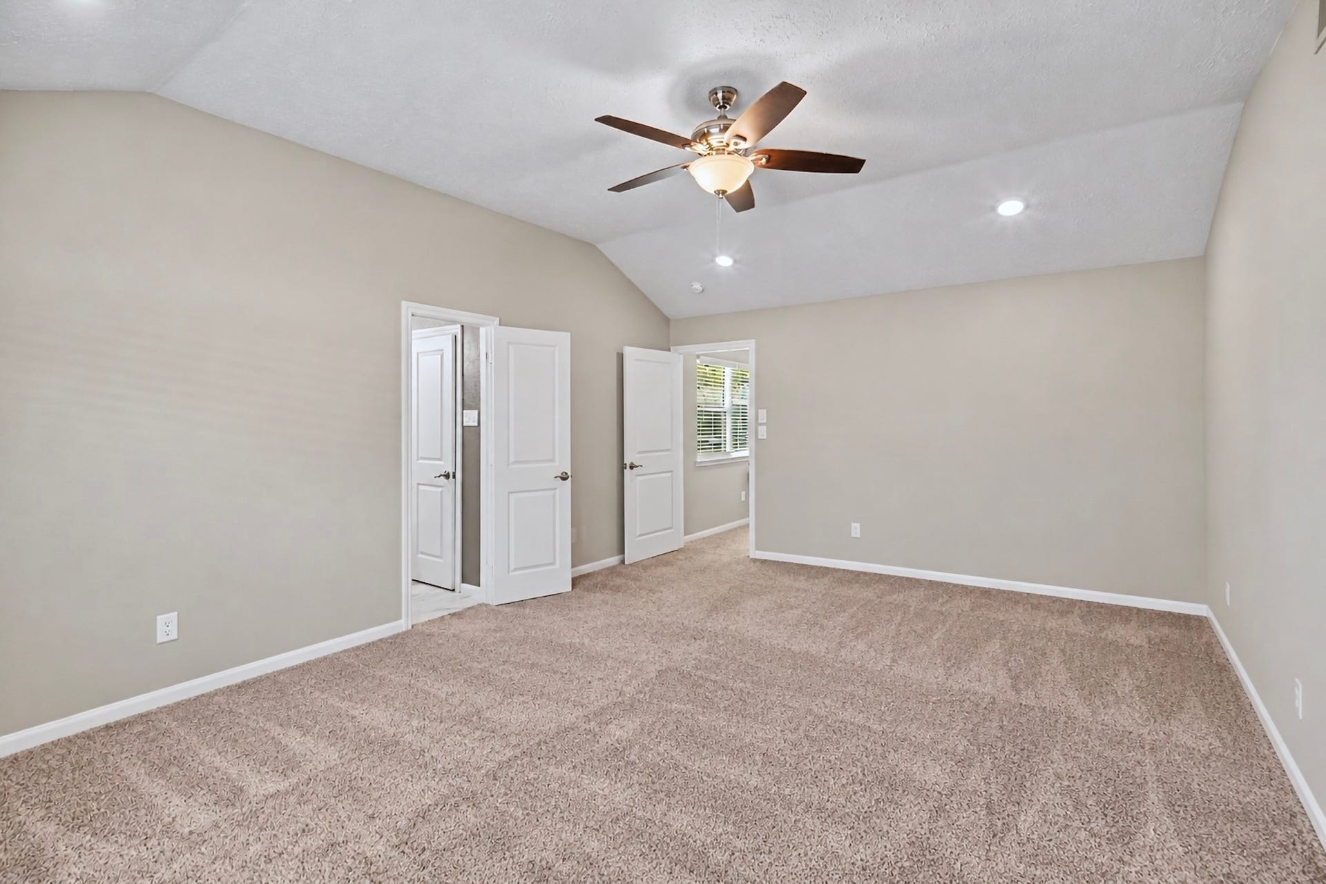 2419 Broken Elm Drive, Richmond, TX 77406 Oversized primary bedroom virtually decluttered.