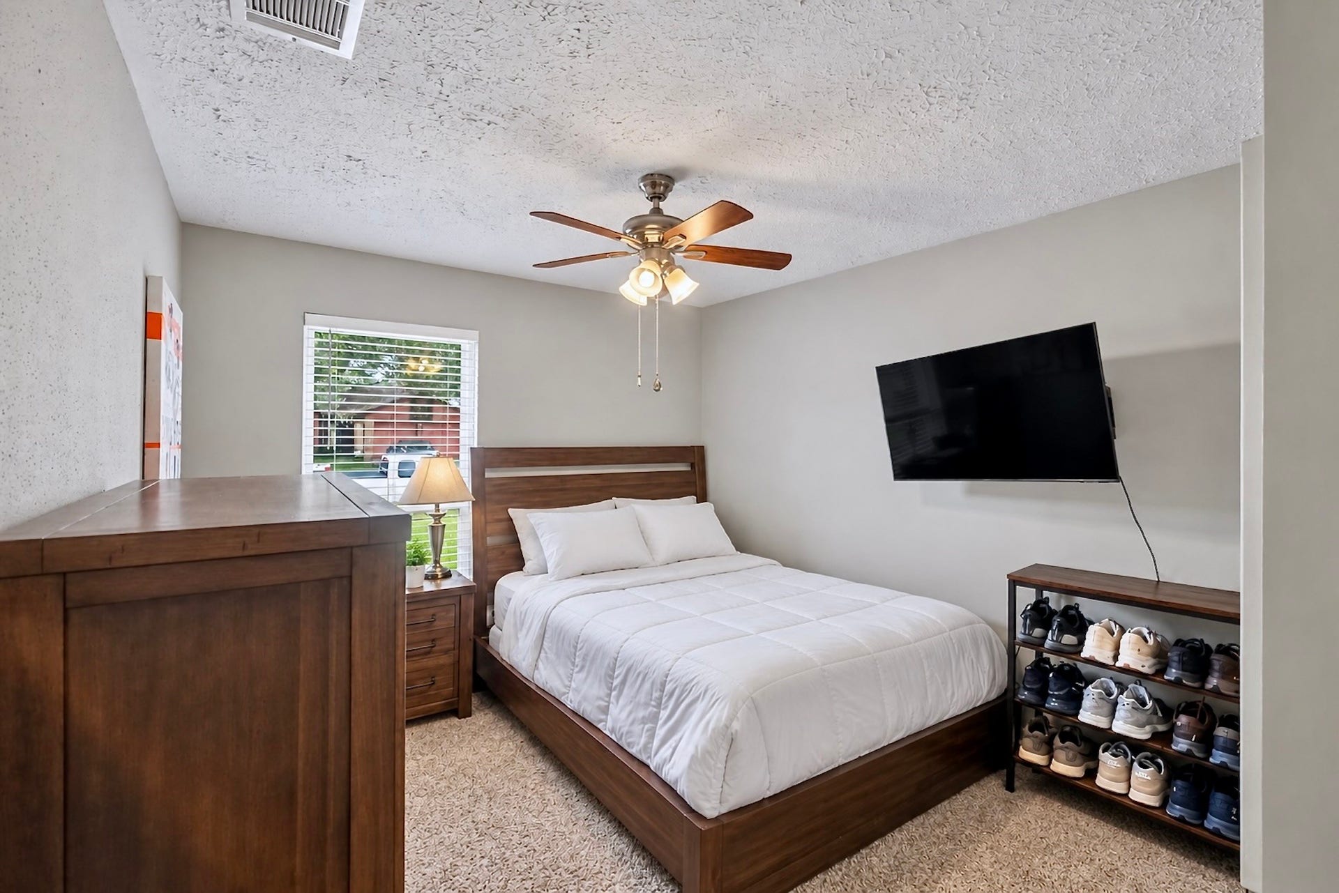 2419 Broken Elm Drive, Richmond, TX 77406 One of three secondary bedrooms positioned apart from the primary suite, giving the floor plan useful separation along with plenty of flexibility for changing needs. Virtually decluttered.