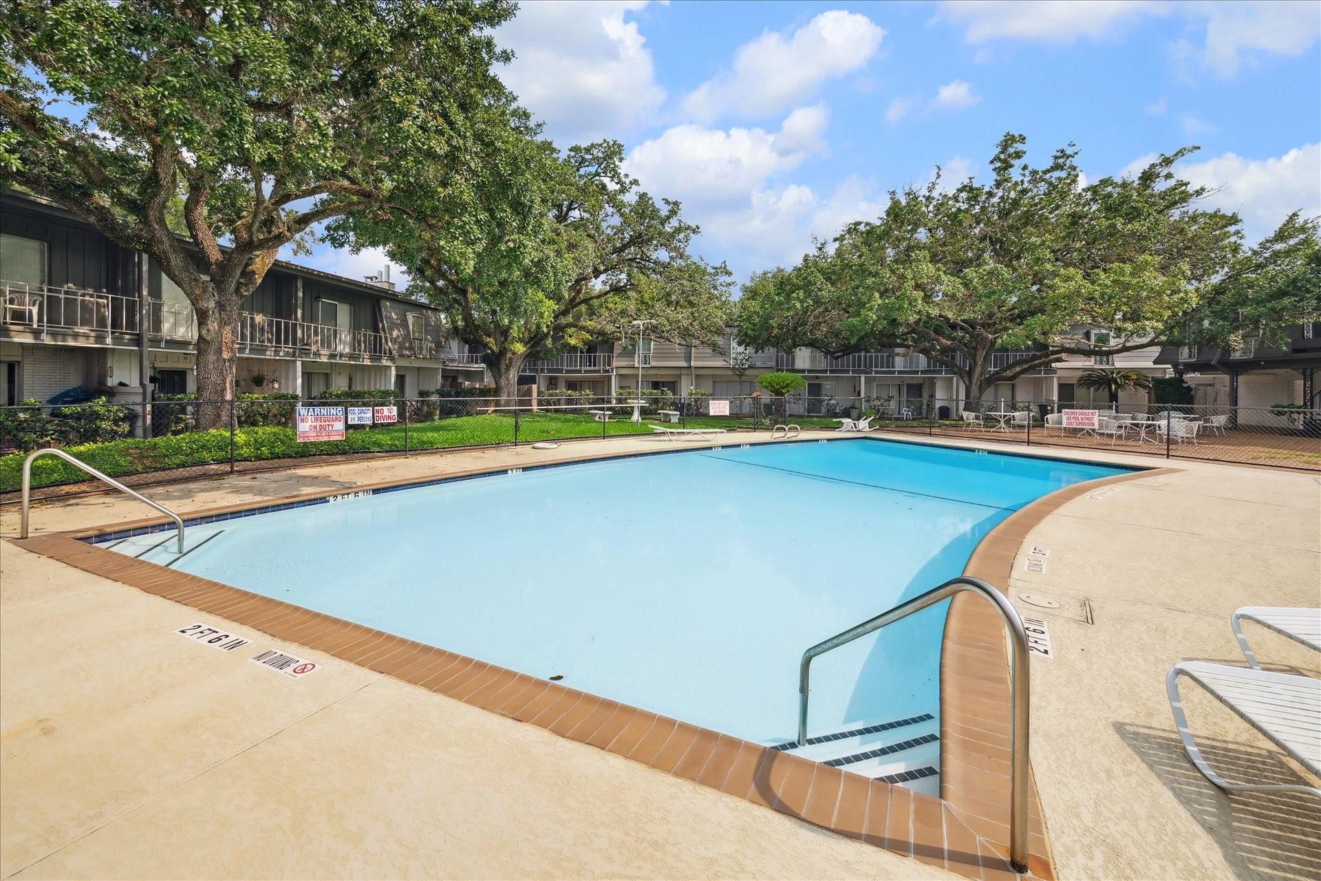 7821 Rue Saint Cyr Street, #55, Houston, TX 77074 Community pool just steps from the home.