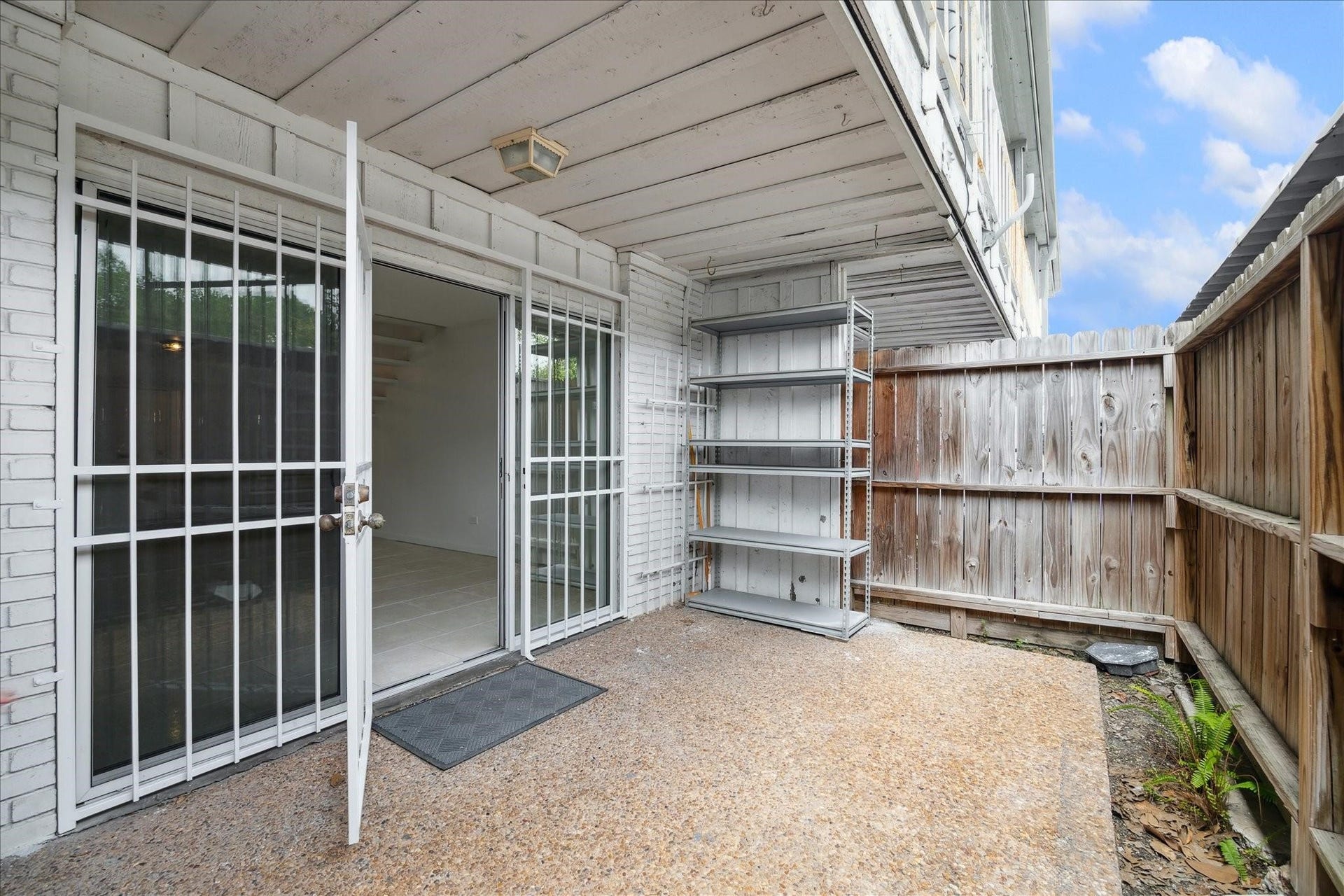 7821 Rue Saint Cyr Street, #55, Houston, TX 77074 Private fenced patioperfect for relaxing or entertaining.
