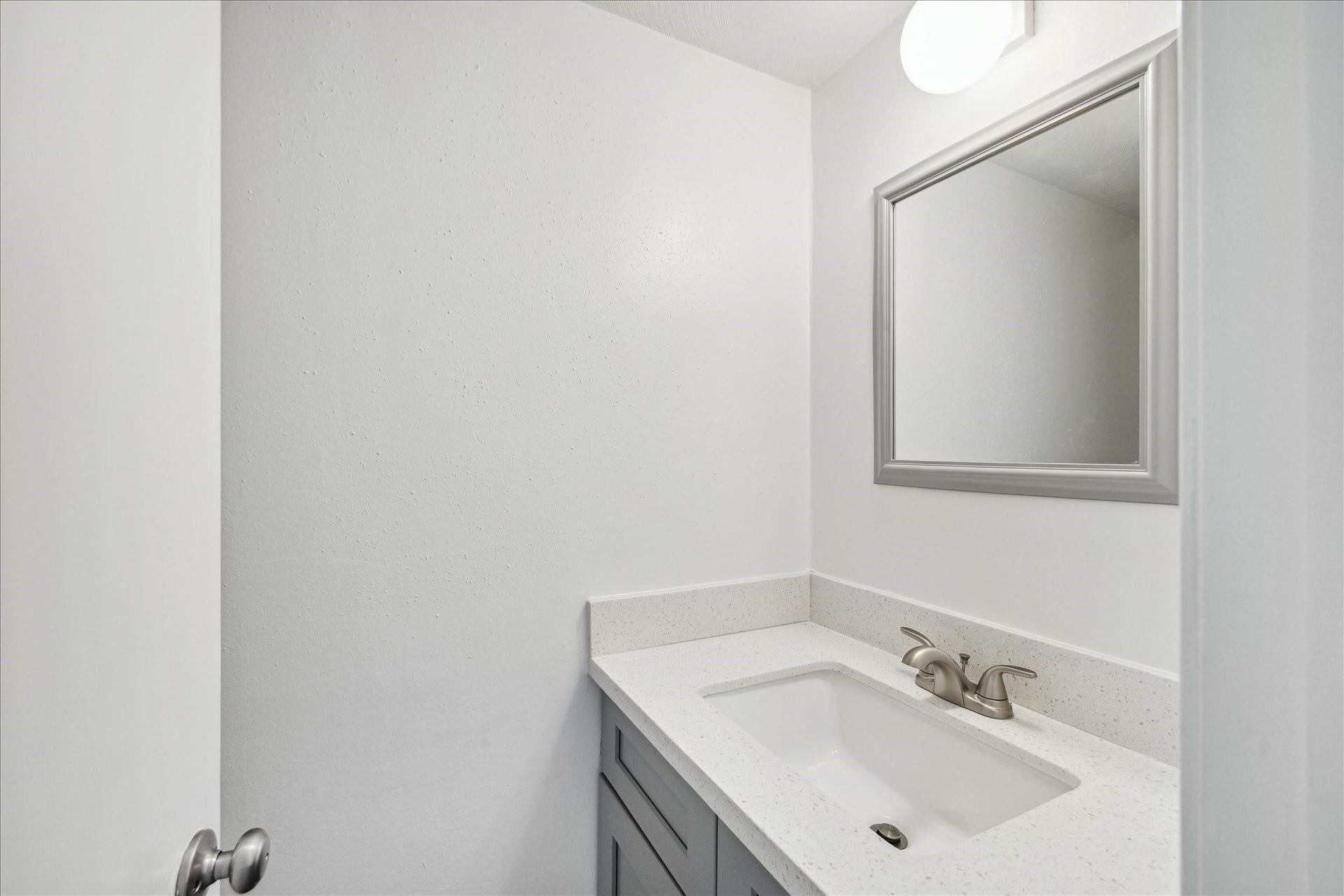 7821 Rue Saint Cyr Street, #55, Houston, TX 77074 Updated powder room with contemporary finishes.