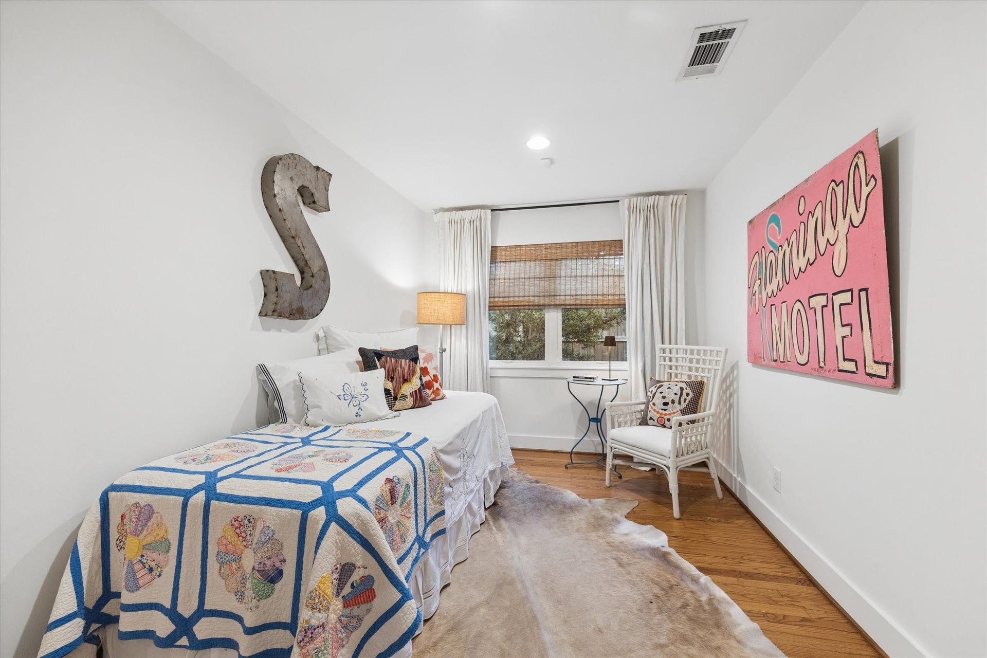 This middle bedroom would also be great as a home office or home gym.  Queen size bed also fits in here nicely.