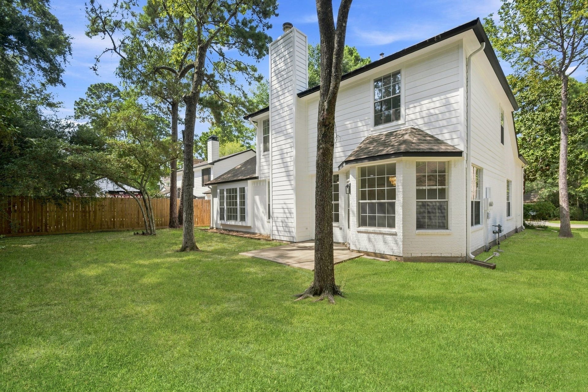 62 S Hidden View Circle, The Woodlands, TX 77381 Enjoy the shade from the trees!