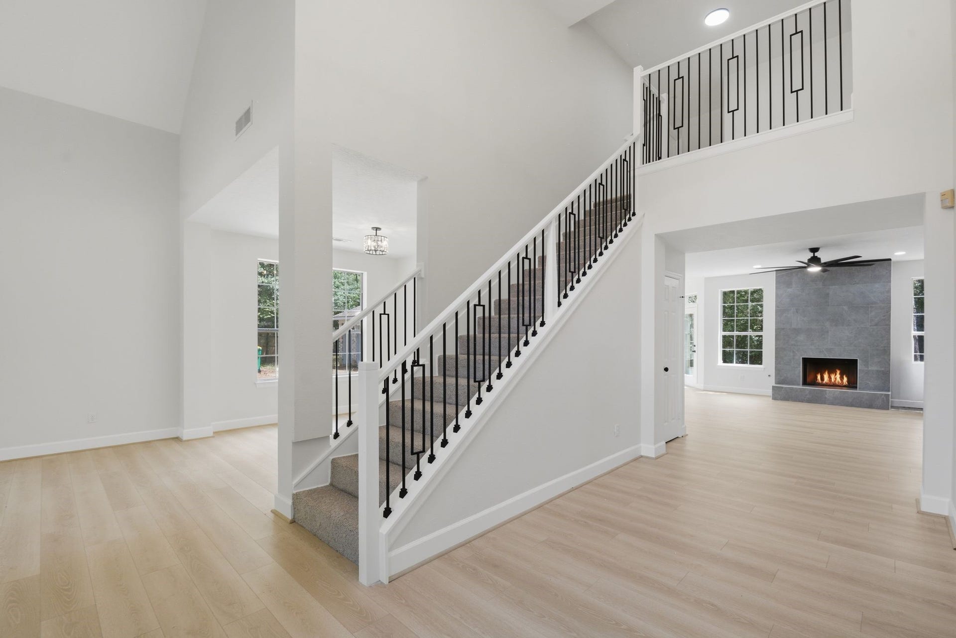 62 S Hidden View Circle, The Woodlands, TX 77381 Brand new wrought iron staircase