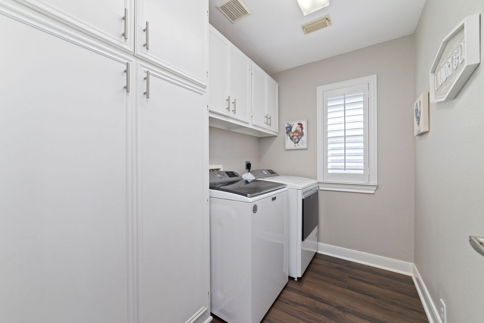 20611 Cypress Tree Lane, Spring, TX 77388 Laundry room with custom cabinets