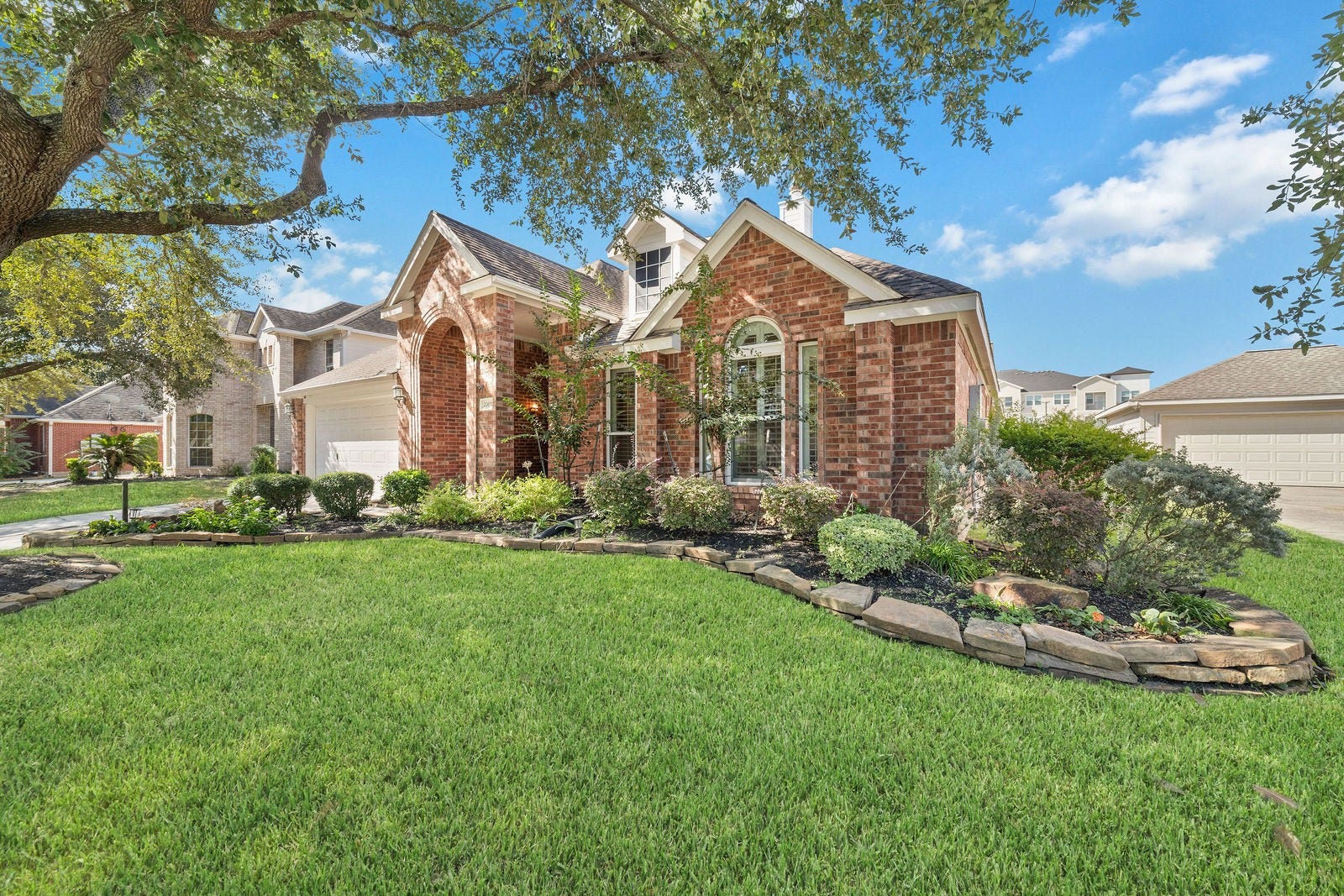20611 Cypress Tree Lane, Spring, TX 77388 Tasteful landscaping and mature tree in the front yard