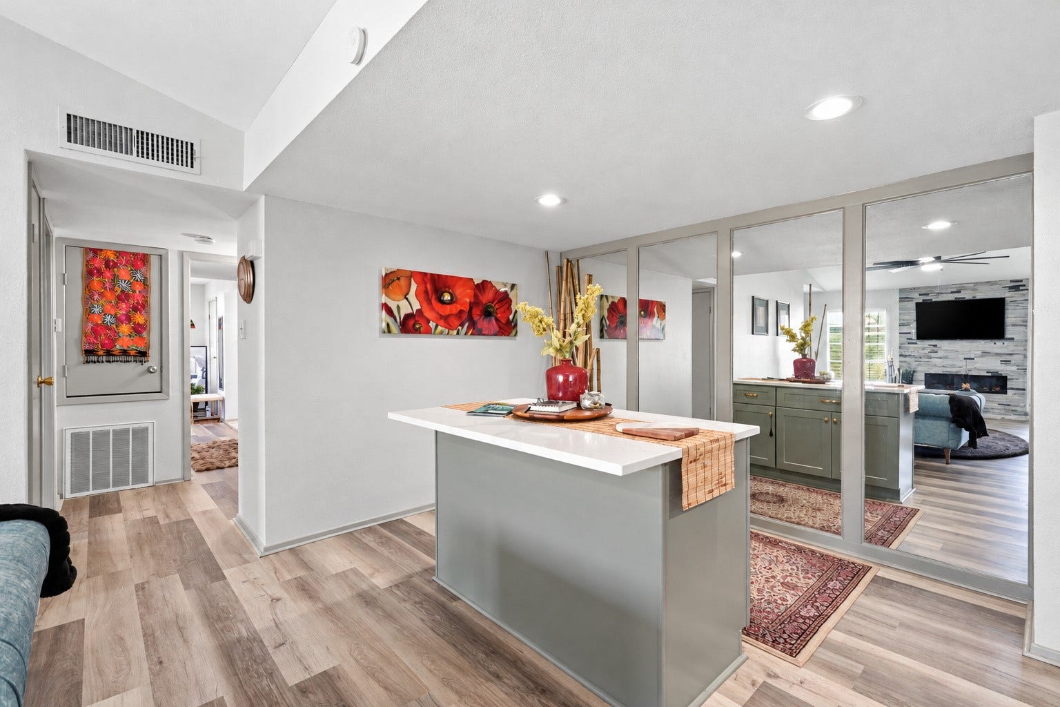 Open layout provides a seamless connection between the kitchen and main living space.