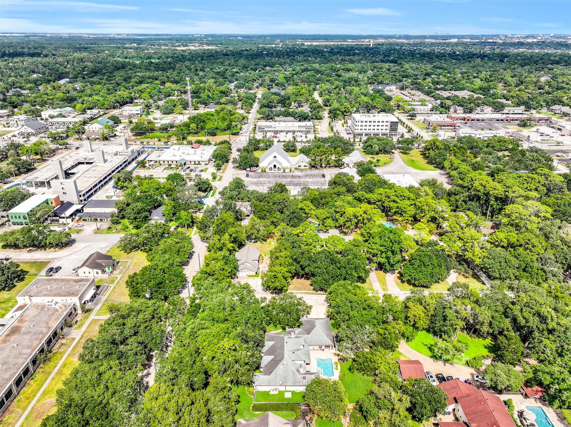 203 W Spreading Oaks Avenue, Friendswood, TX 77546 Just steps to Friendswood Drive!