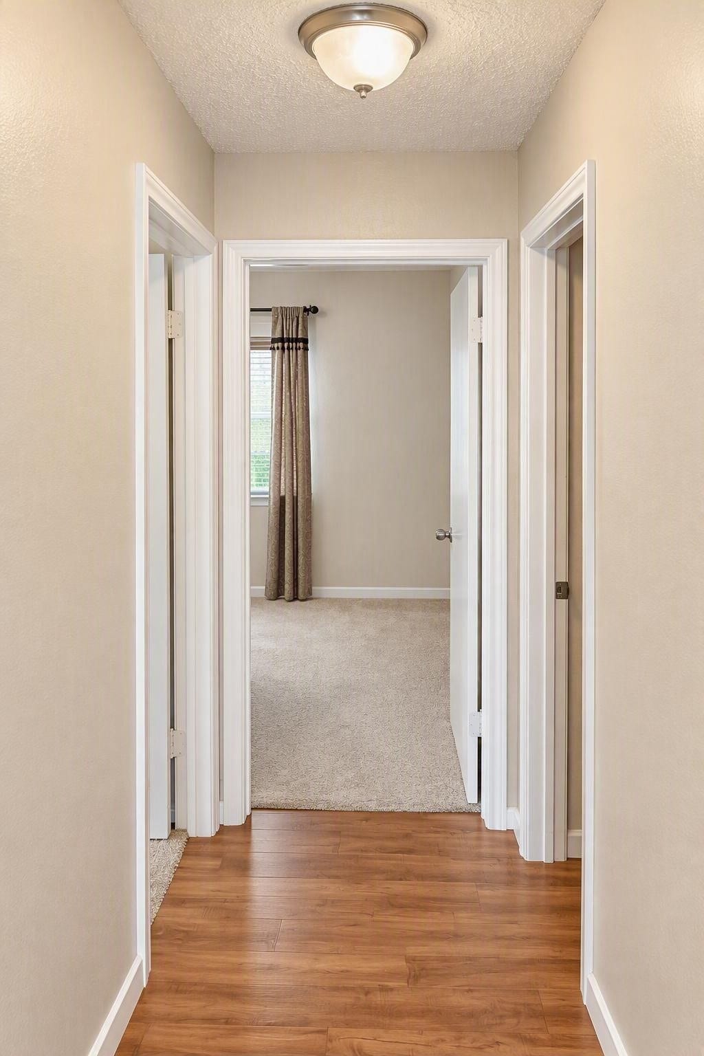 6631 Inwood West Drive, Houston, TX 77088 Secondary hall leads to the second bath and bedrooms 2 & 3