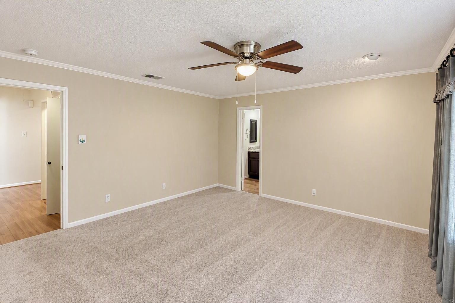 6631 Inwood West Drive, Houston, TX 77088 Spacious primary suite offers privacy from the other bedrooms a beautifully updated bathroom ensuite