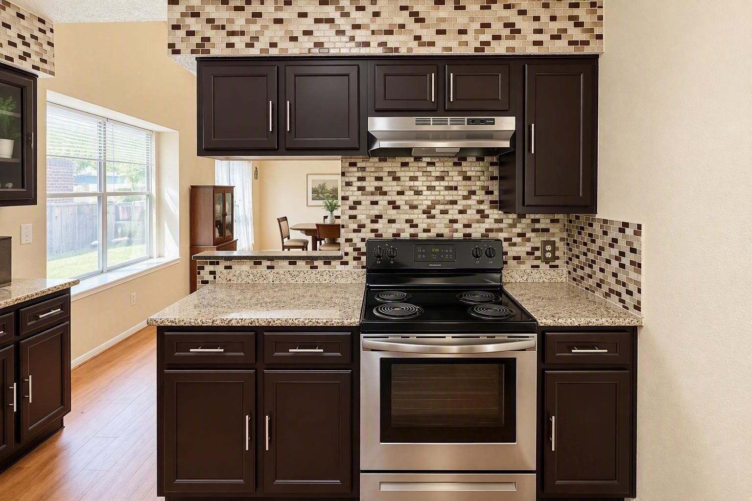 6631 Inwood West Drive, Houston, TX 77088 Free standing electric range and oven offers convection, baking, stove top and frying options with a true exhaust to pull heat and smoke our of the home.