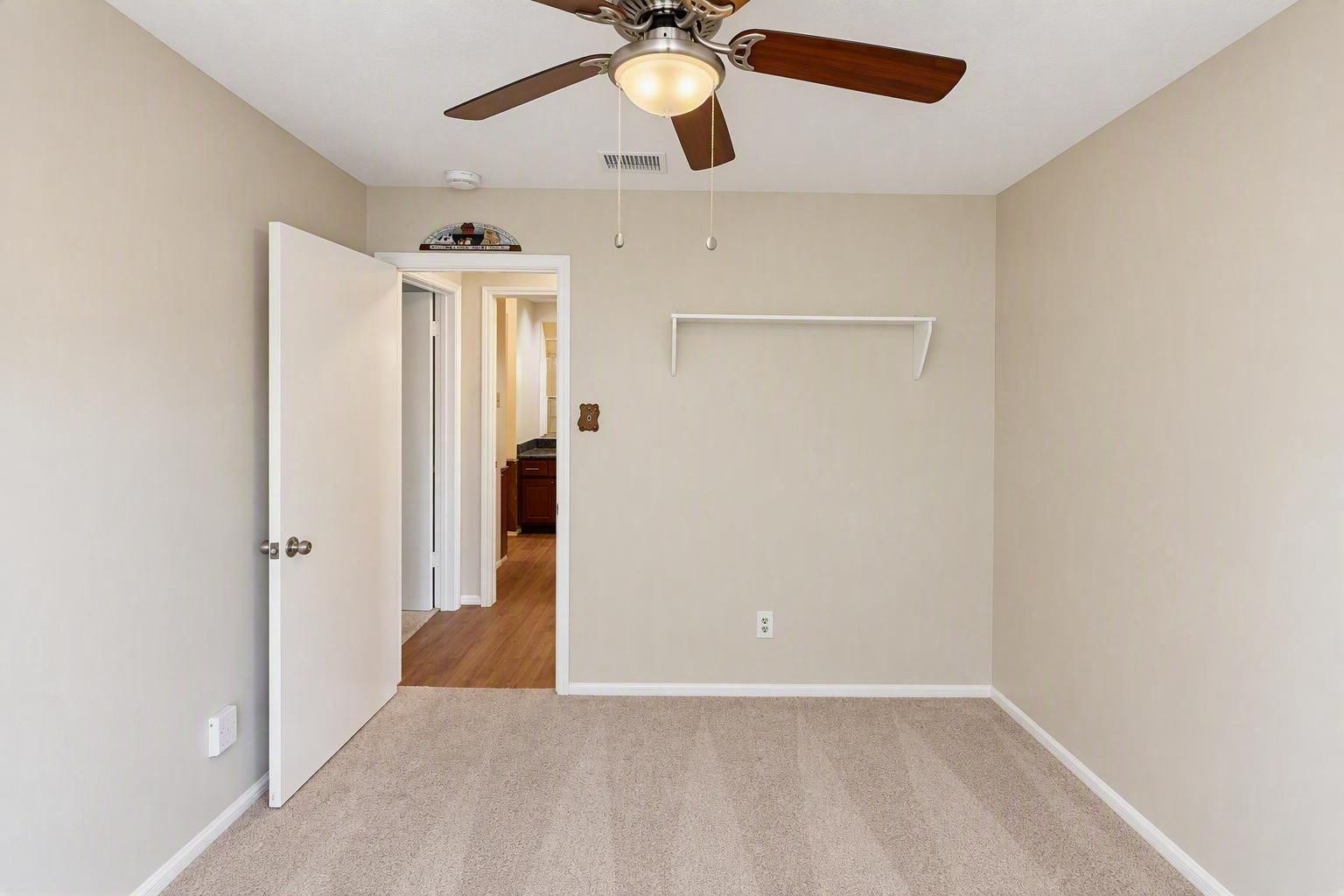 6631 Inwood West Drive, Houston, TX 77088 3rd bedroom also features a ceiling fan and walk-in closet