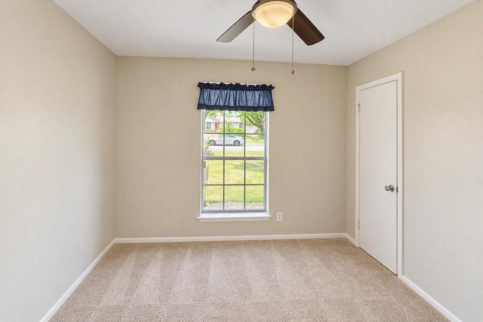 6631 Inwood West Drive, Houston, TX 77088 2nd bedroom , features ceiling fan and walk in closet