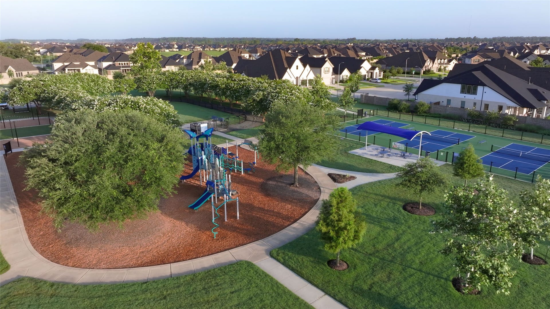 19819 Epona Creek Drive, Tomball, TX 77377 The Amira community playground, known as Pony Park, is a unique, nature-inspired play space tucked under large, mature trees that provide significant natural shade.