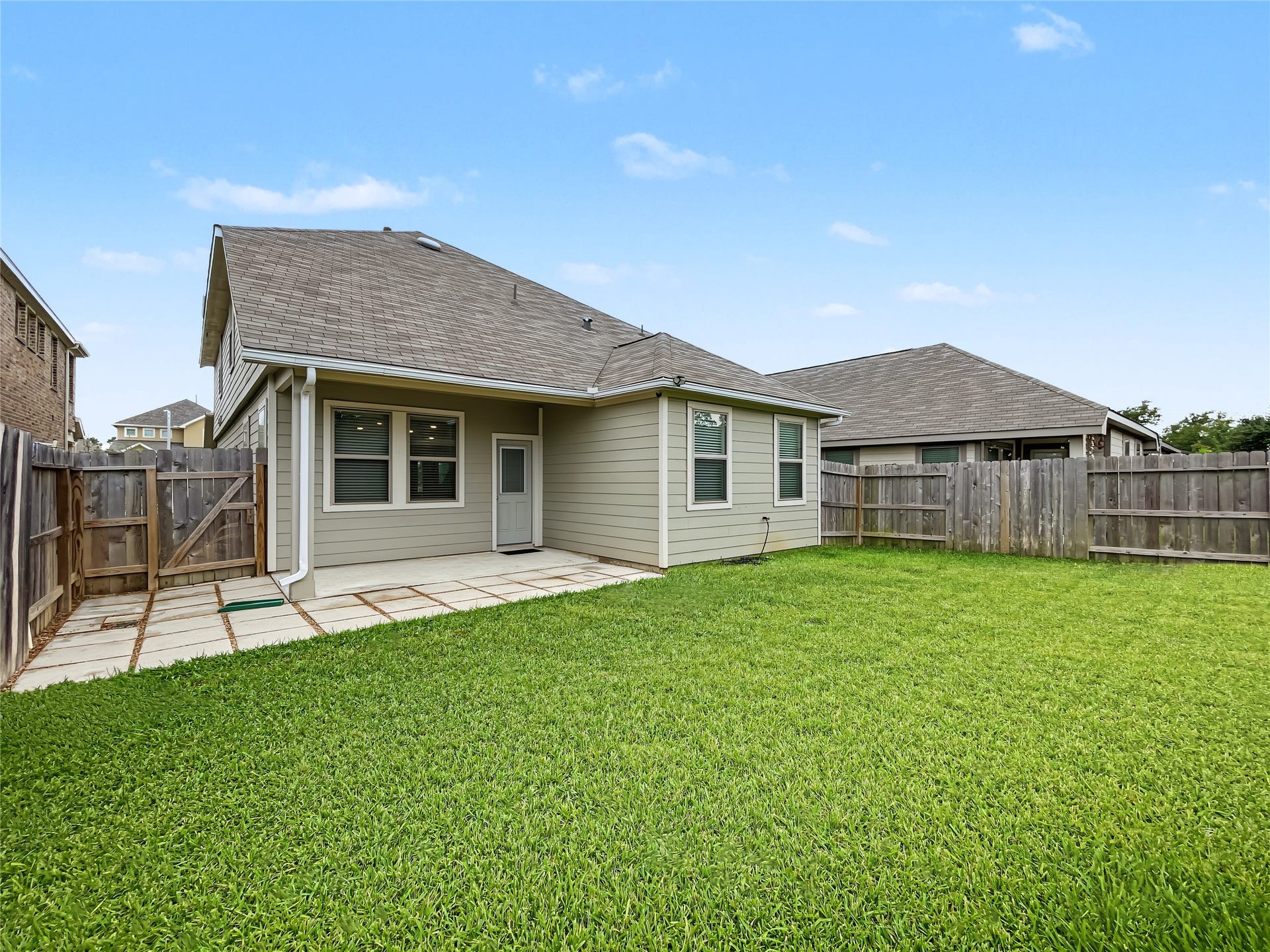 1423 Cecilia Vines Drive, Conroe, TX 77301 This house offers a huge backyard perfect to enjoy your outdoor activities.