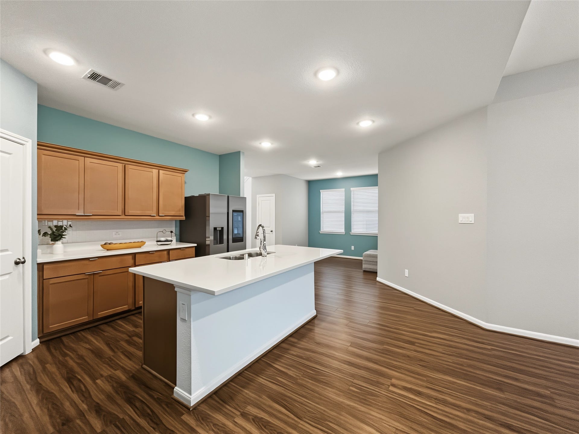 1423 Cecilia Vines Drive, Conroe, TX 77301 View from the kitchen to the dining room.