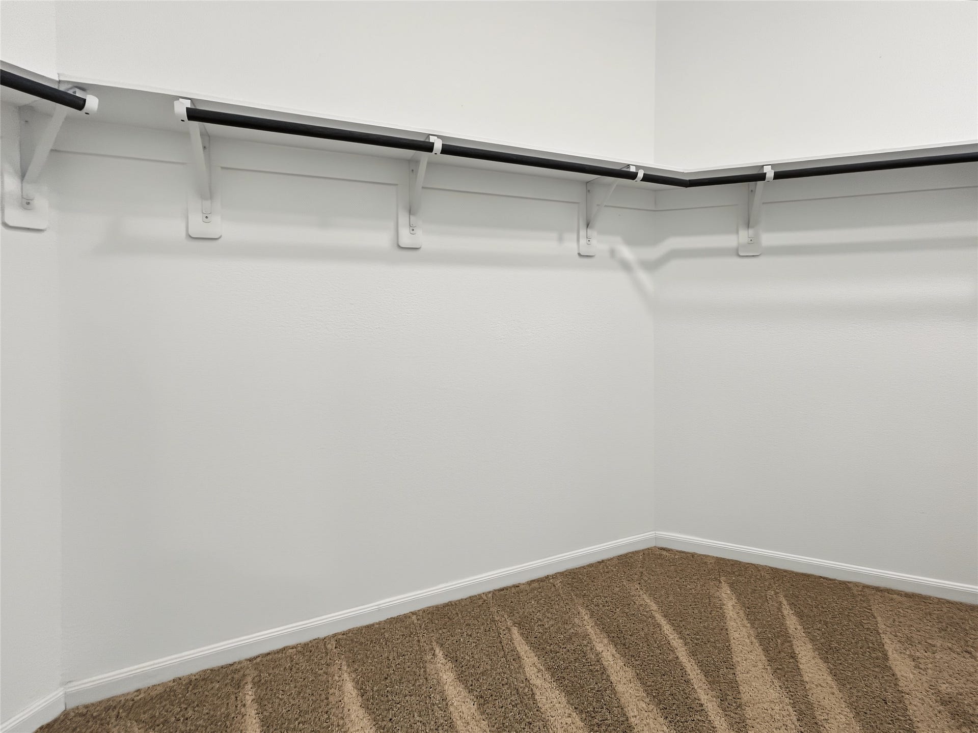 1423 Cecilia Vines Drive, Conroe, TX 77301 View of the ample walk-in closet inside the primary bathroom.