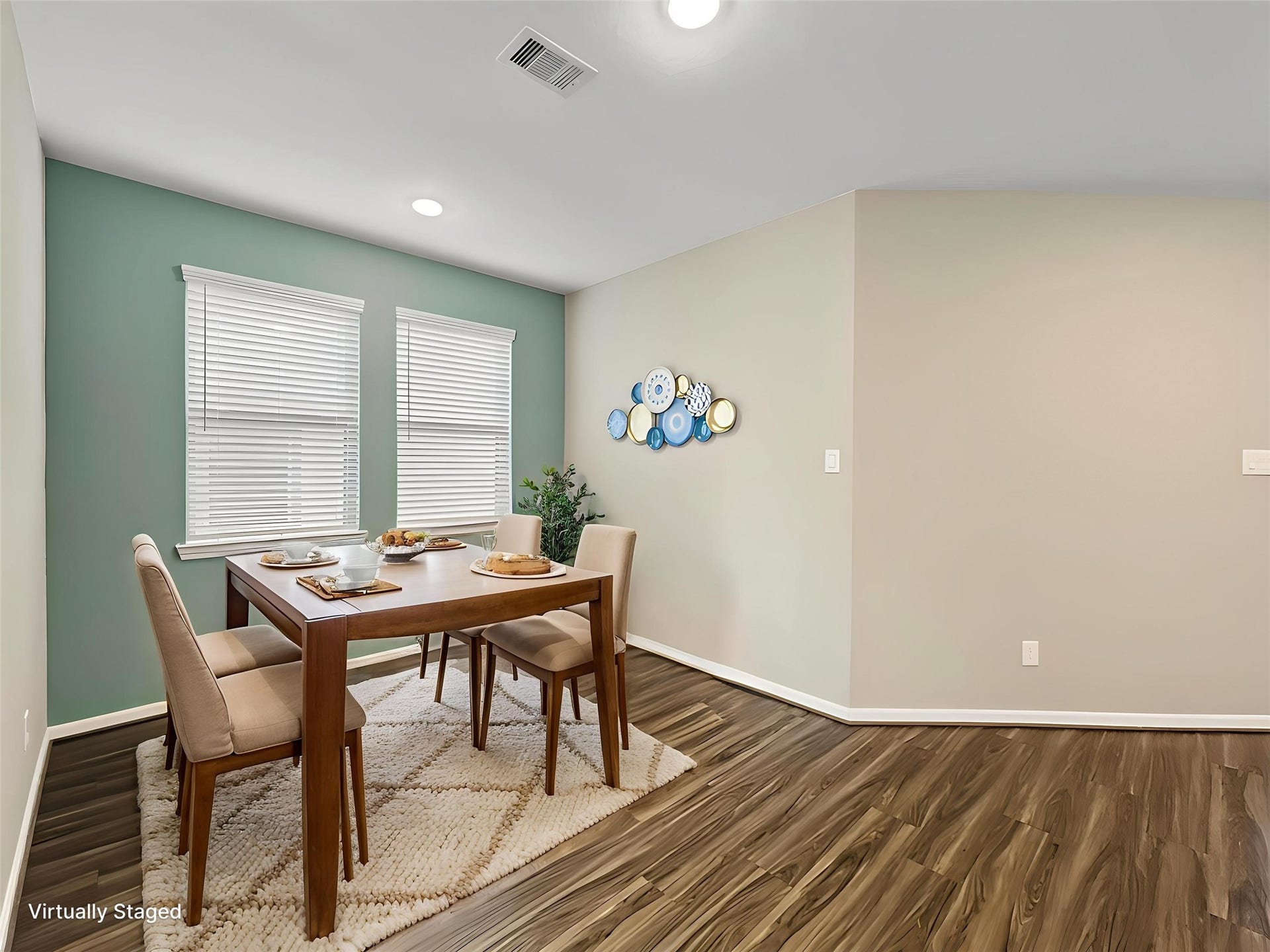 1423 Cecilia Vines Drive, Conroe, TX 77301 View of the dining room virtually staged.