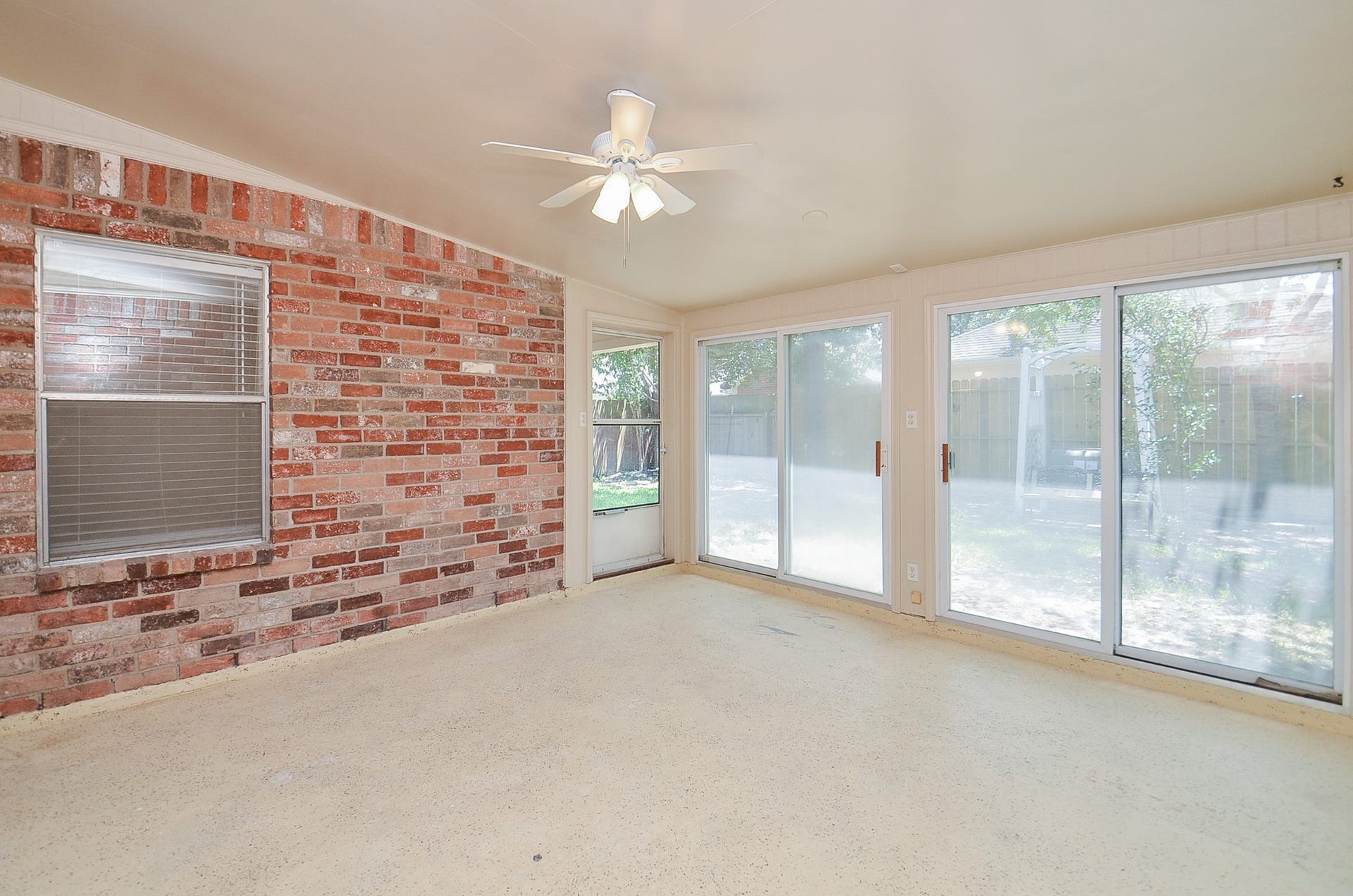 19127 Lookout Mountain Lane, Katy, TX 77449 Enjoy your time in this enclosed patio with sliders.