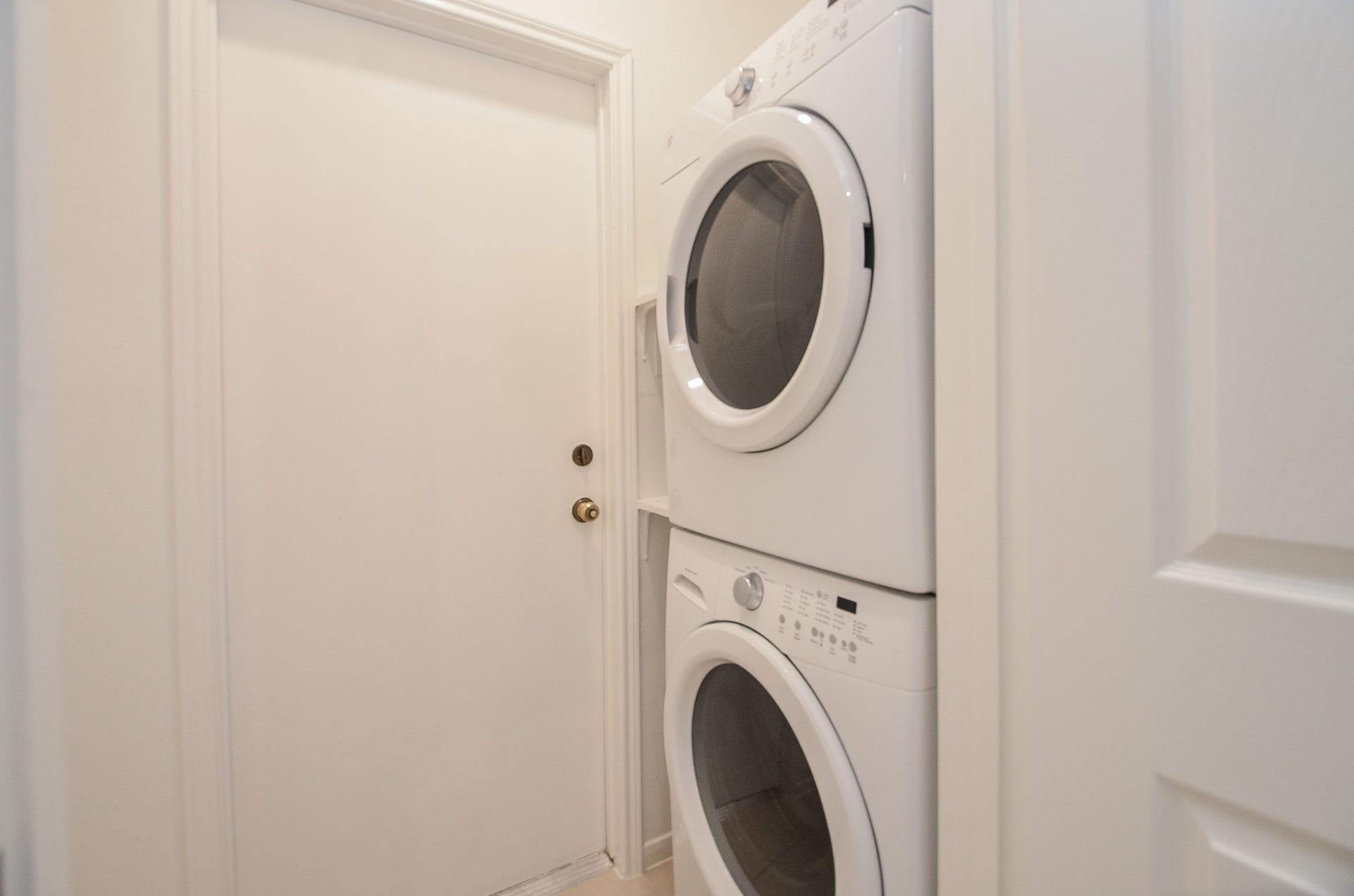 19127 Lookout Mountain Lane, Katy, TX 77449 This is to show that a stackable washer and dryer fits perfect in this laundry space.