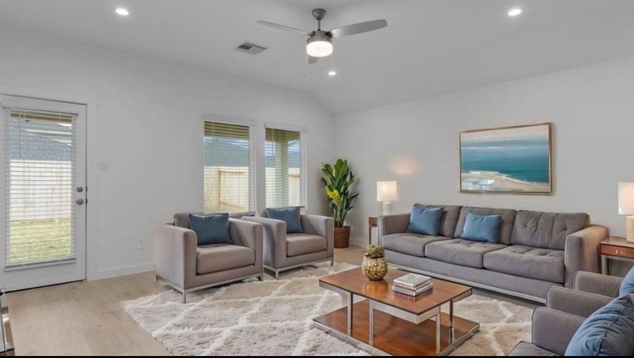 1338 Isola Bella Drive, Richmond, TX 77406 Living Room - virtually staged