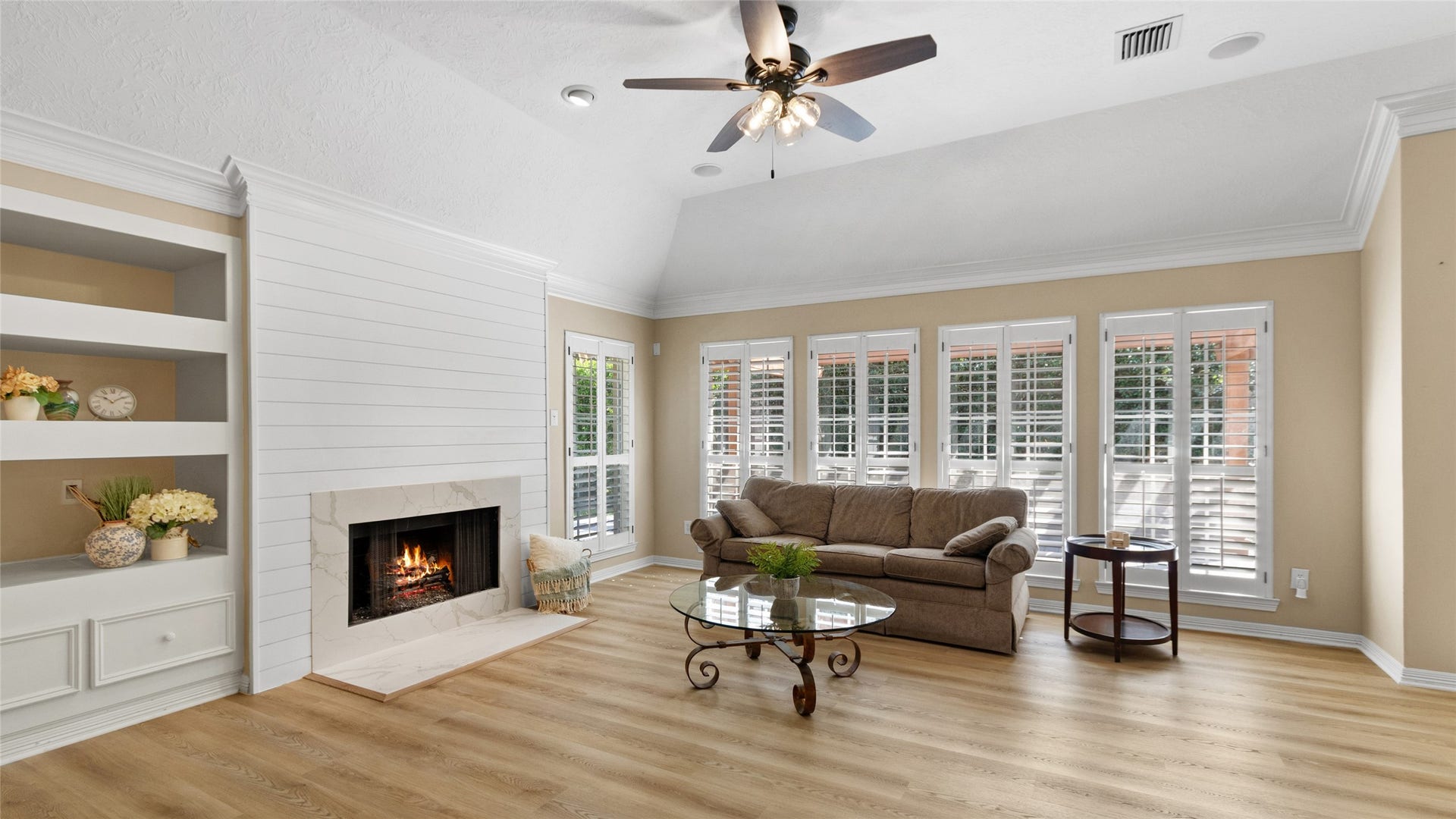 2430 Fairway Pointe Drive, League City, TX 77573 Gather with friends and family in this inviting living space by the fireplace.