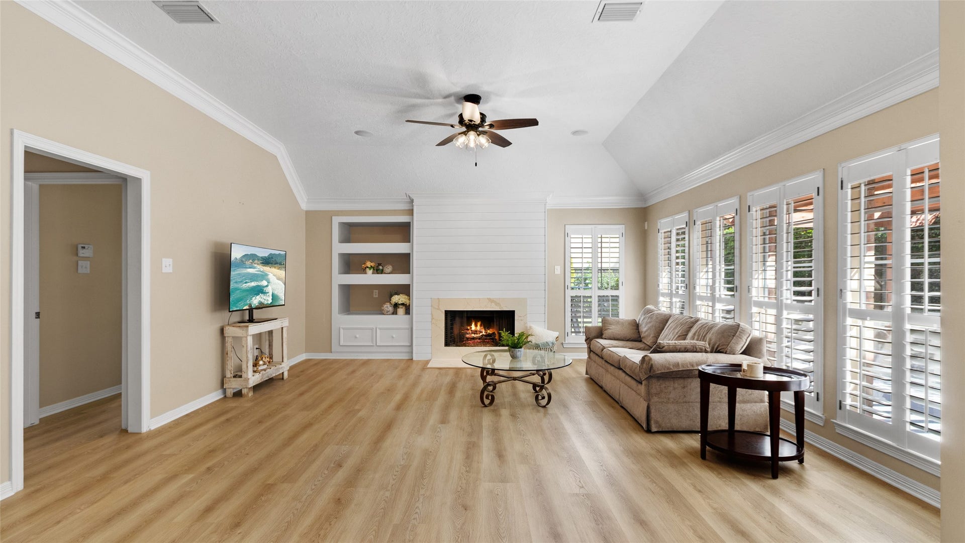 2430 Fairway Pointe Drive, League City, TX 77573 Stunning fireplace with shiplap and elegant quartz finish.