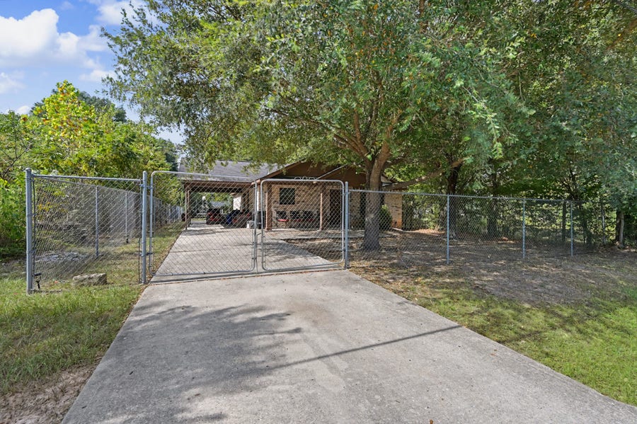 Property photo for 704 Dr Martin Luther King Jr Place N, Conroe, TX