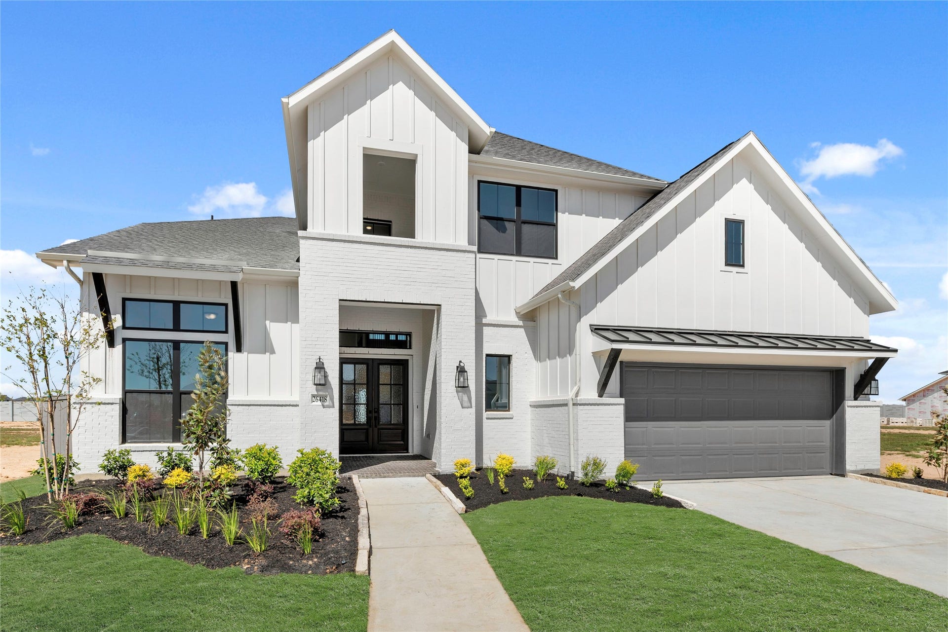 26418 Blissful Delight Road, Hockley, TX 77447 Move in Ready. Westin Homes *New Construction* Asher X Plan. Grass is digitally enhanced.
