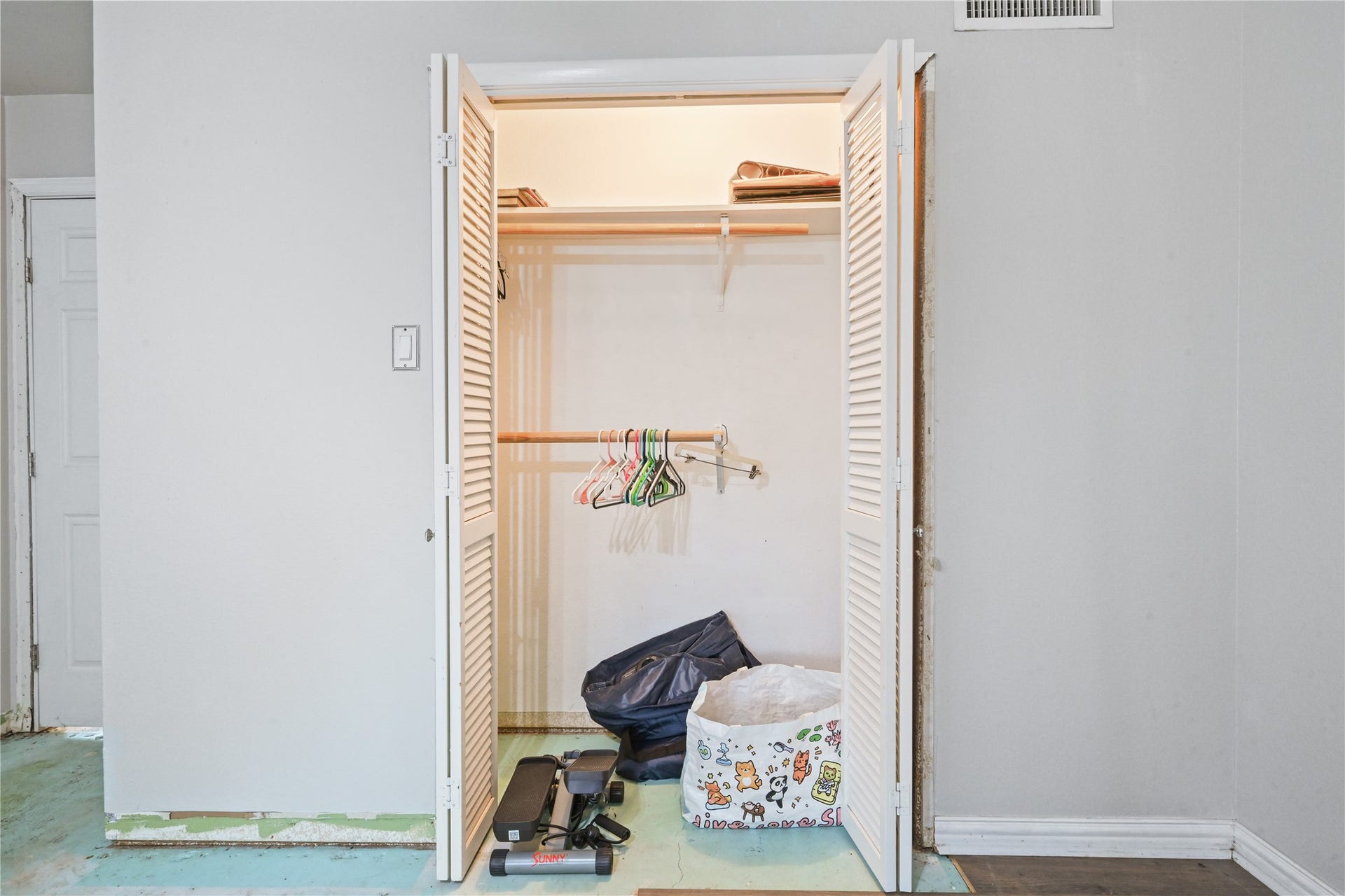 107 Harbour Town Lane, Conroe, TX 77356 Convenient laundry nook or utility closet space, perfectly positioned for easy access.