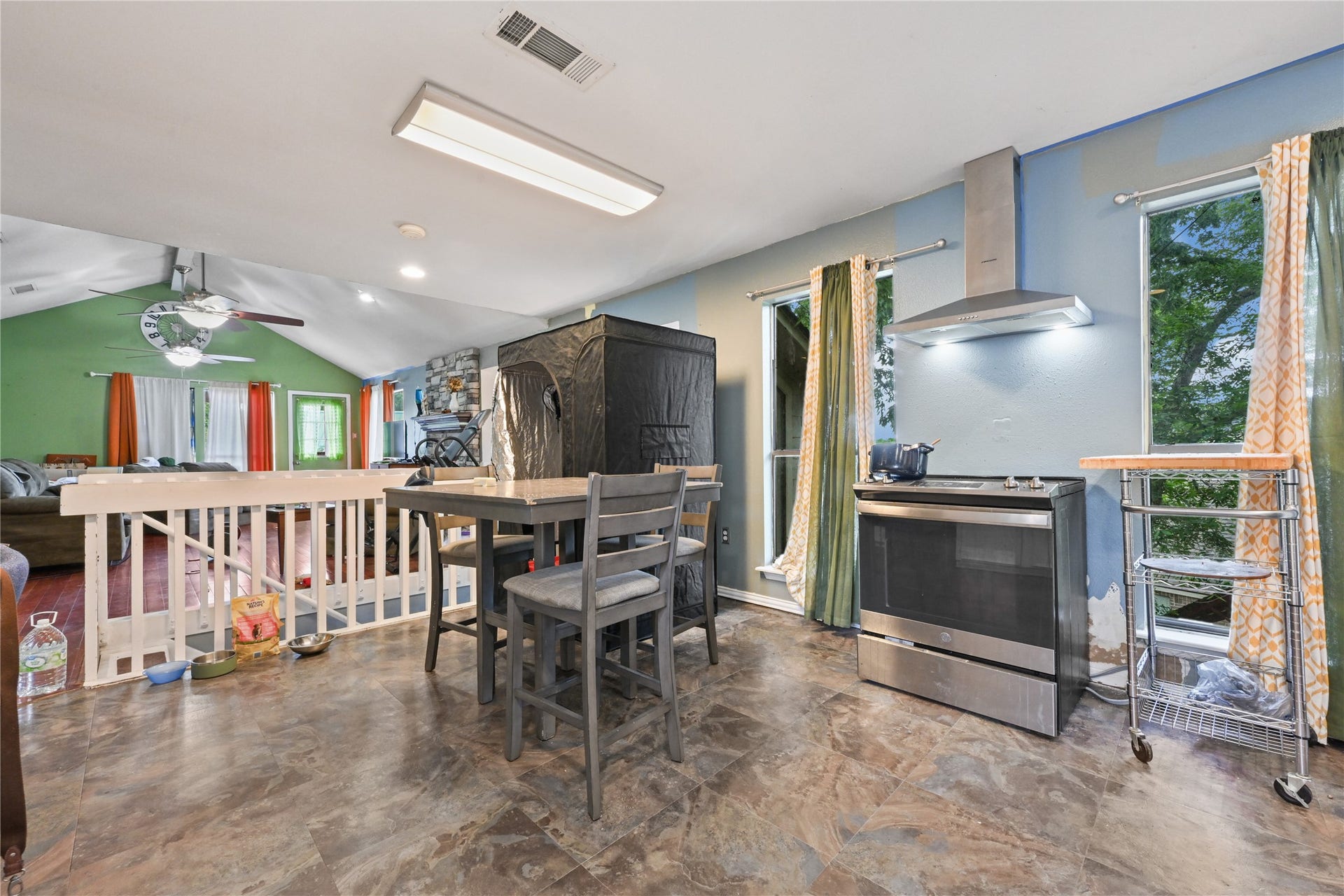 107 Harbour Town Lane, Conroe, TX 77356 Full view of the open kitchen and dining layout, perfect for casual family meals and seamless hosting.