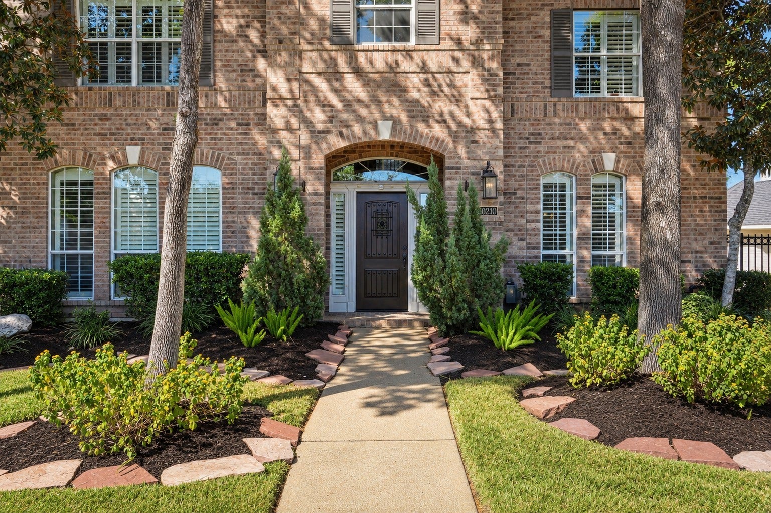 20210 Prim Pine Court, Cypress, TX 77433 A new, inviting front door adds a beautiful touch of curb appeal.