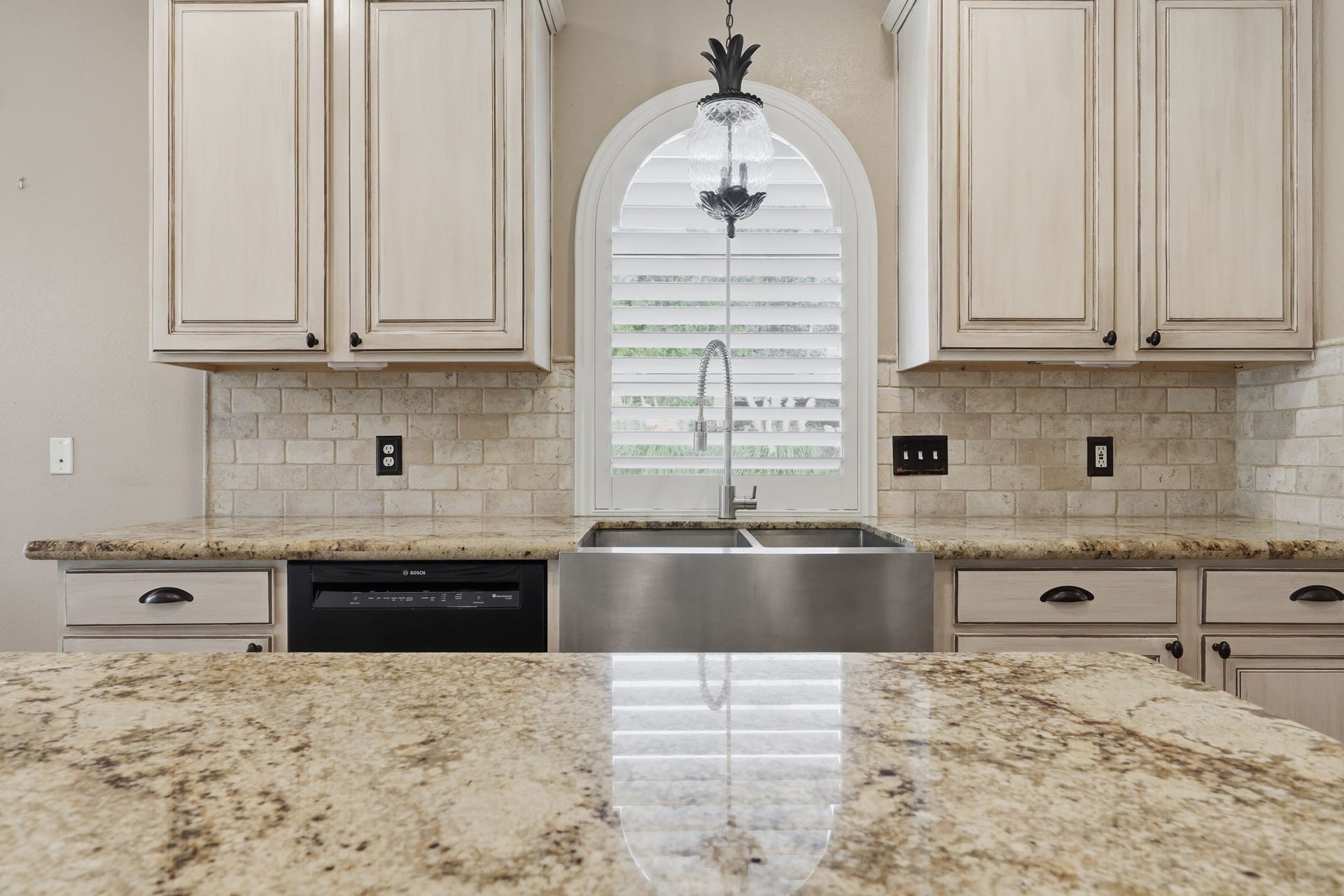 20210 Prim Pine Court, Cypress, TX 77433 Spacious counters, a large island, and farmhouse sink.