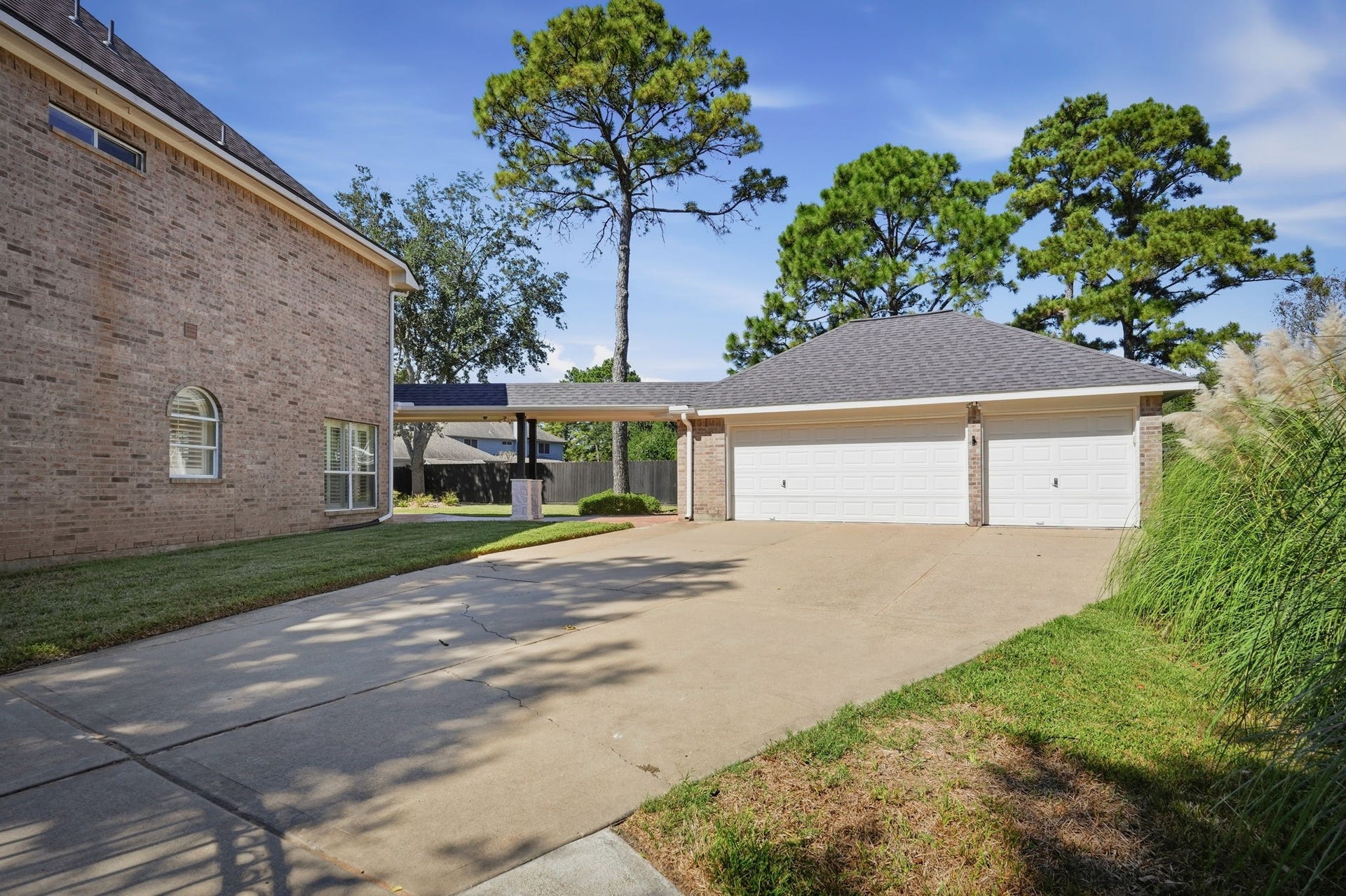 20210 Prim Pine Court, Cypress, TX 77433 Spacious three-car detached garage.