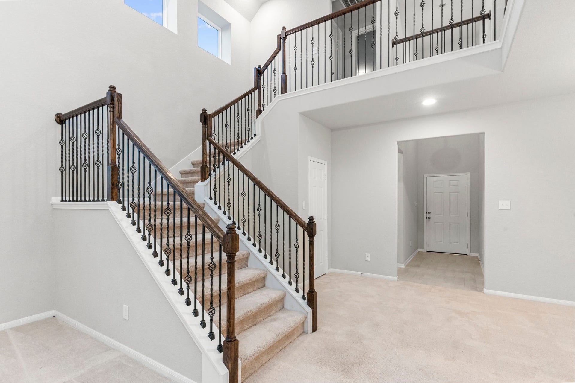 5406 Rustic Ruby Dr, Fulshear, TX 77423 Elegant beautiful wrought iron staircase
