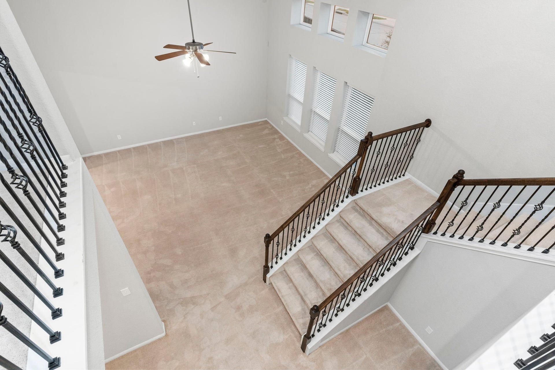 5406 Rustic Ruby Dr, Fulshear, TX 77423 Stunning View of the Open Concepts Living Room with soaring High Ceiling