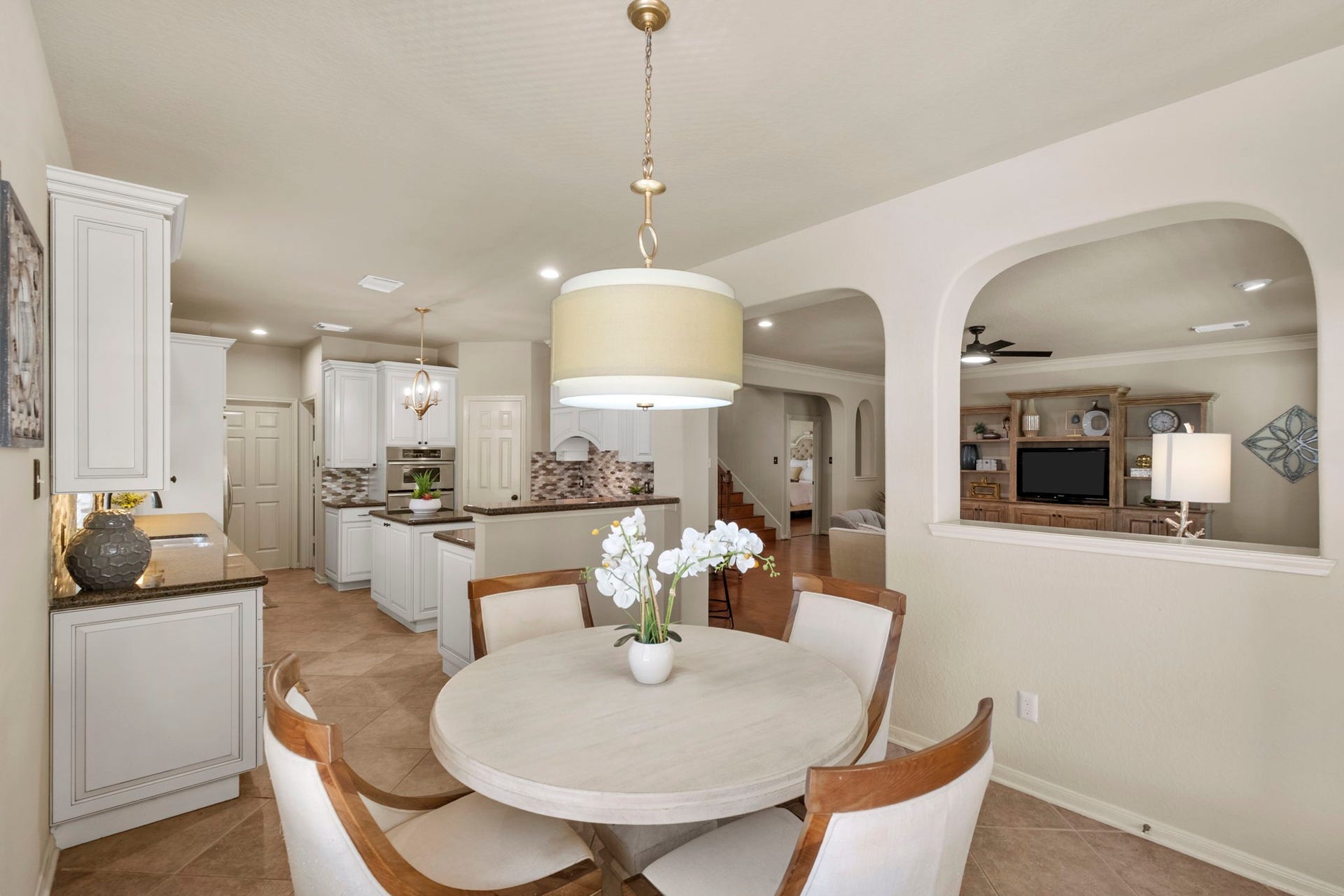 9614 Pennington Lane, Missouri City, TX 77459 Breakfast area overlooks the backyard and pool.