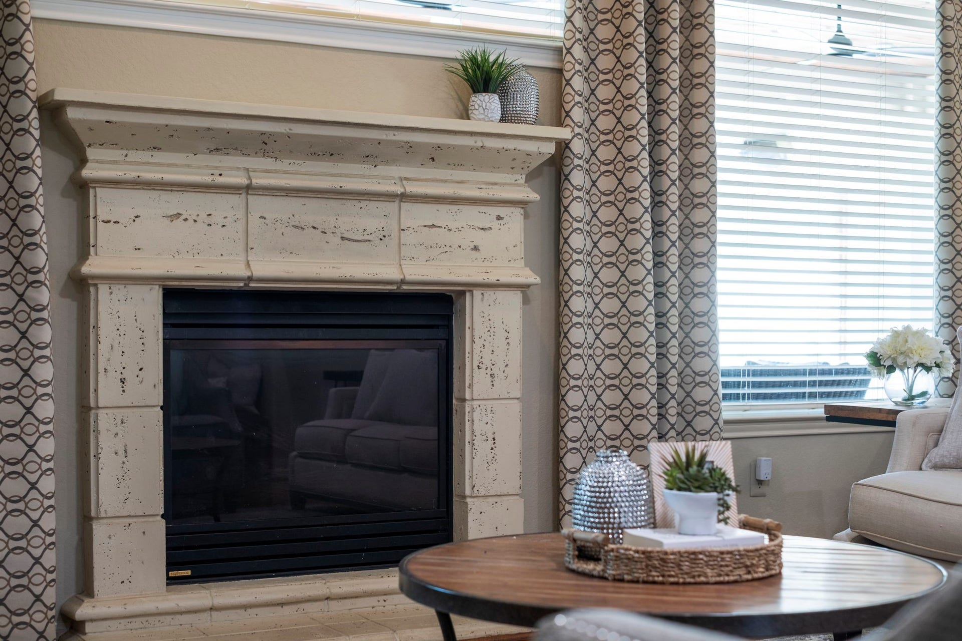 9614 Pennington Lane, Missouri City, TX 77459 Cozy fireplace anchors the main living area with timeless charm.
