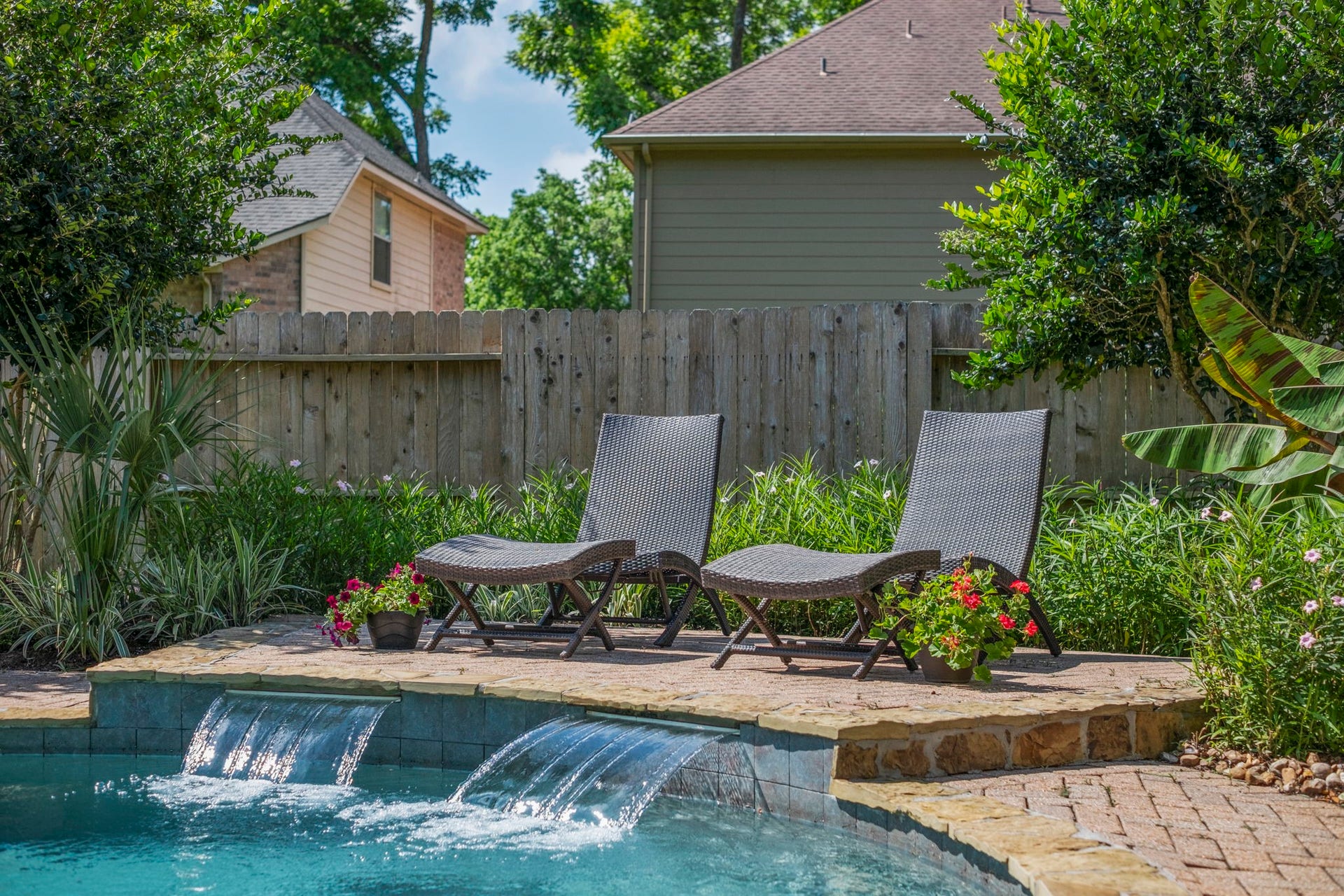 9614 Pennington Lane, Missouri City, TX 77459 Backyard oasis combines pool, spa, and outdoor living in one exceptional setting.