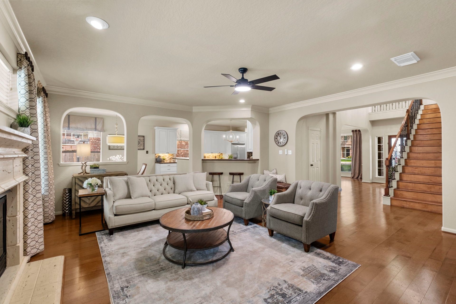 9614 Pennington Lane, Missouri City, TX 77459 Wood and tile flooring can be found throughout the downstairs living spaces.