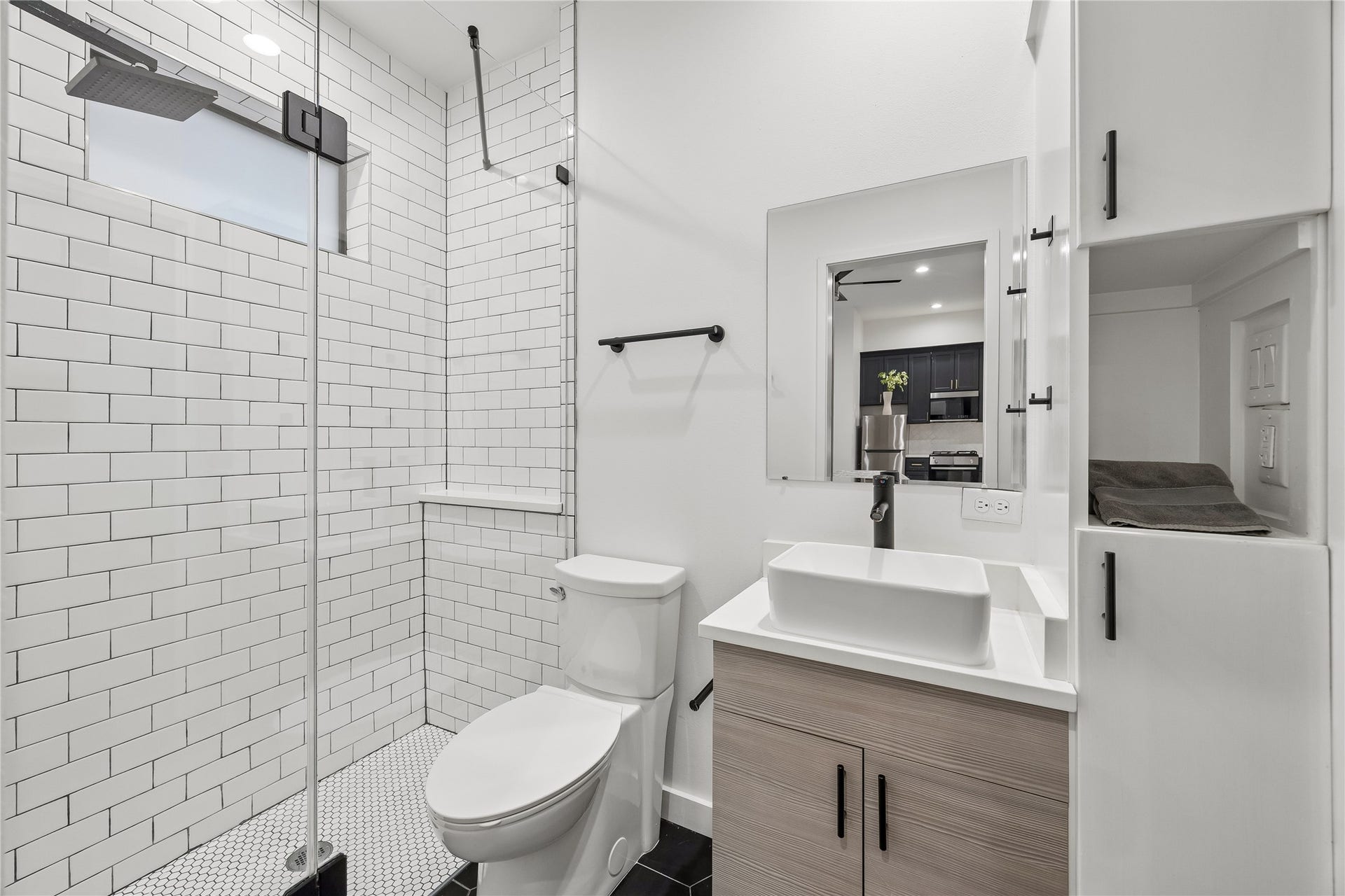 513 Memorial Heights Drive, Houston, TX 77007 Bathroom with stackable laundry units