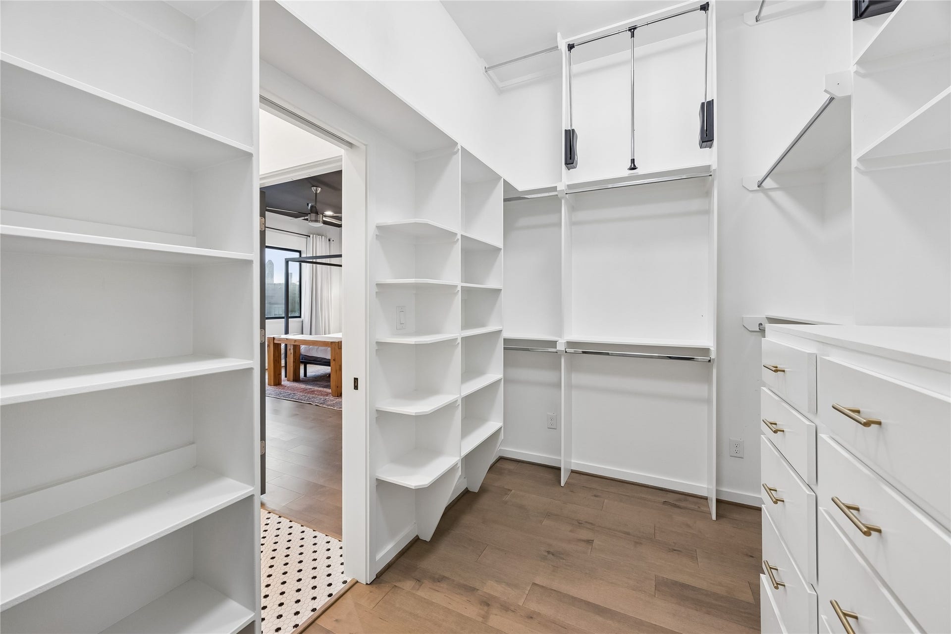 513 Memorial Heights Drive, Houston, TX 77007 Walk-in closet with pocket doors in primary