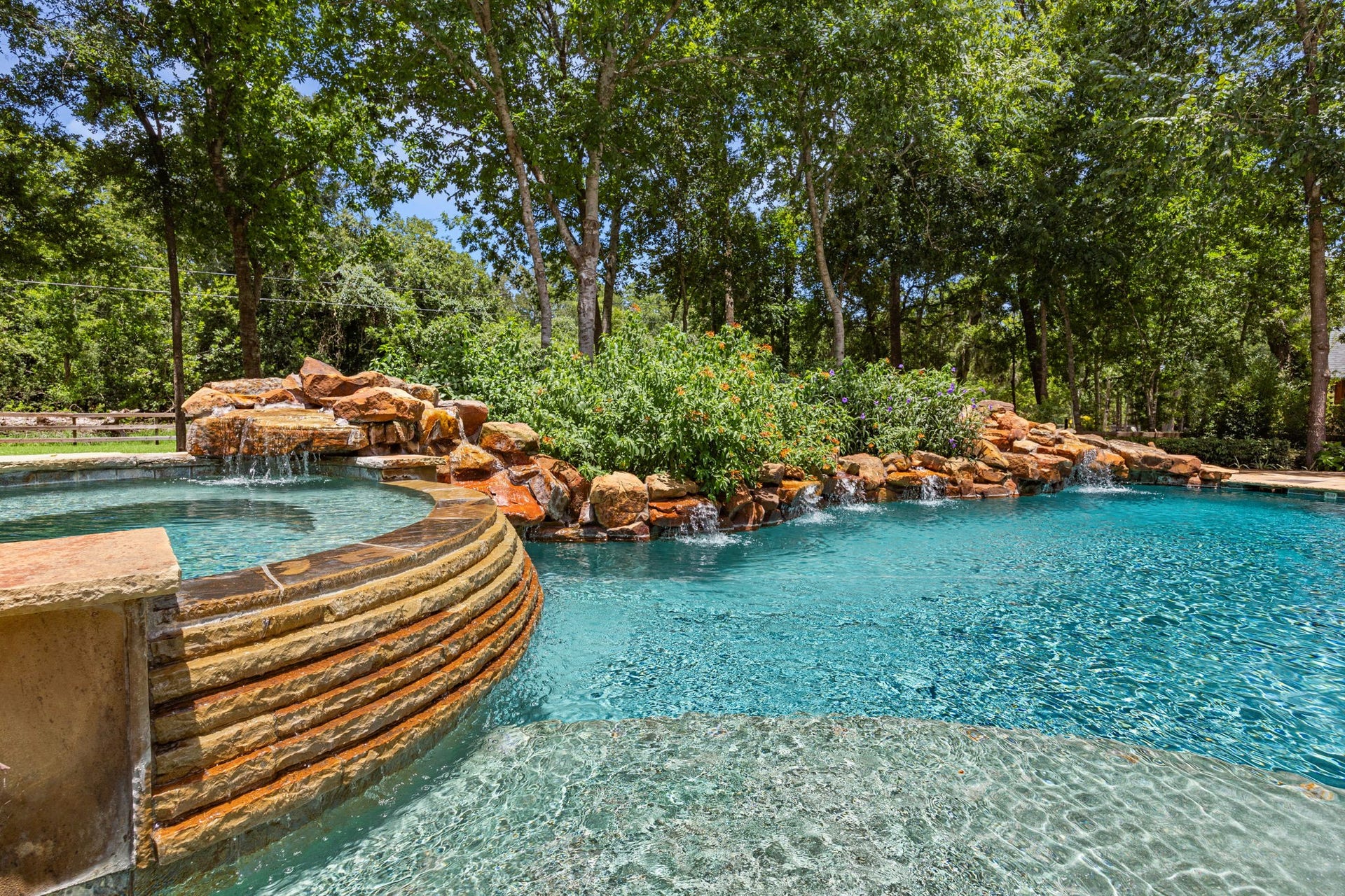 2734 Forest View, Richmond, TX 77406 All rocked areas include waterfalls.